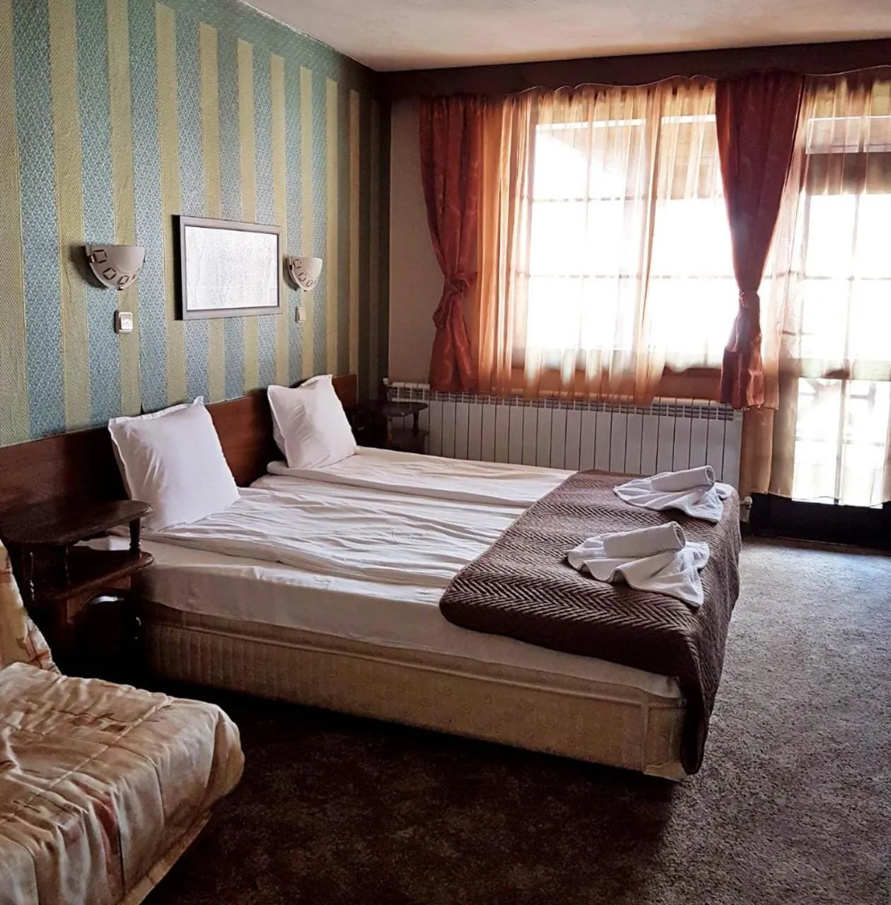 Bed in Hotel St. George Pobedonosets