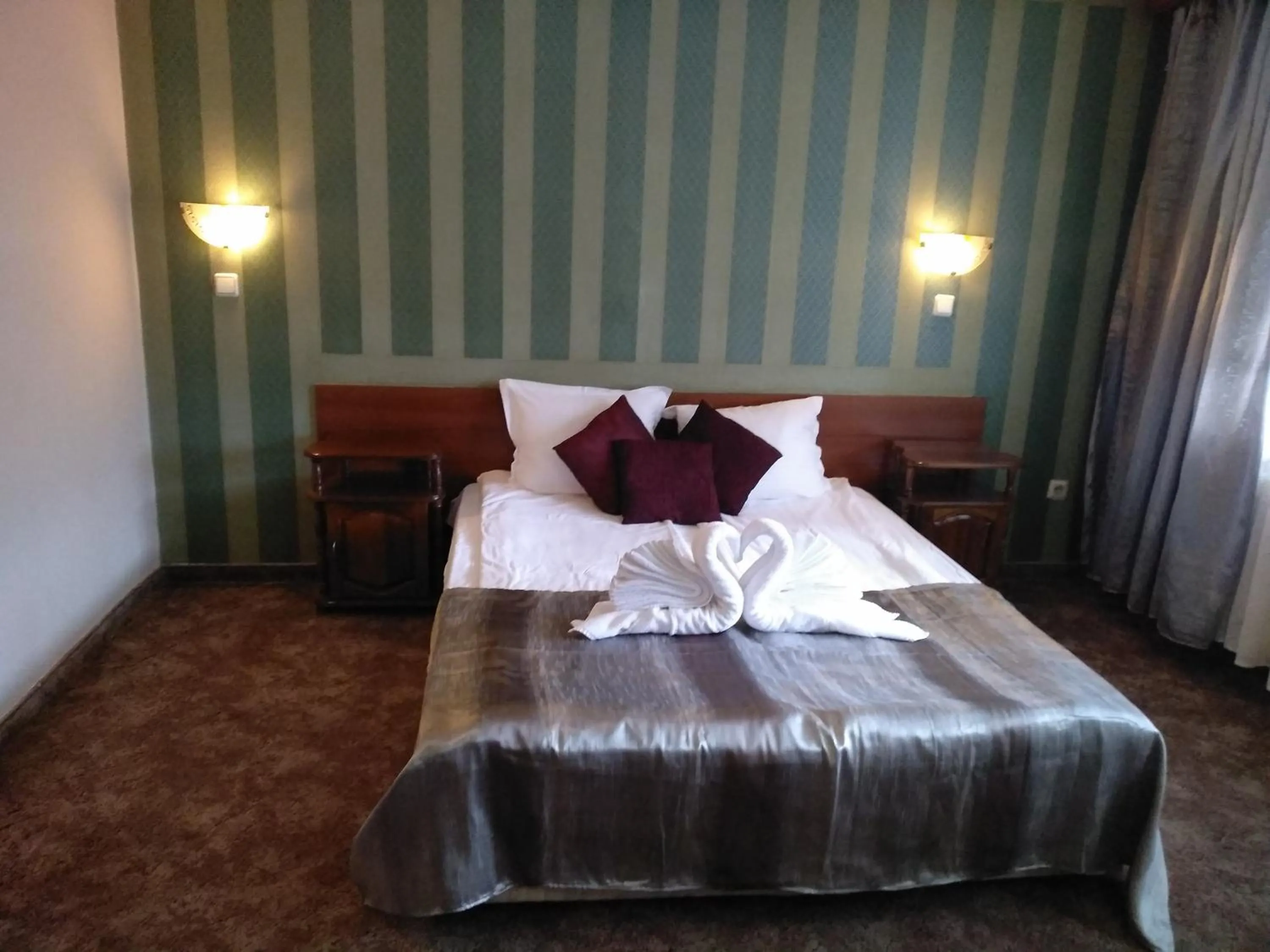 Bed in Hotel St. George Pobedonosets