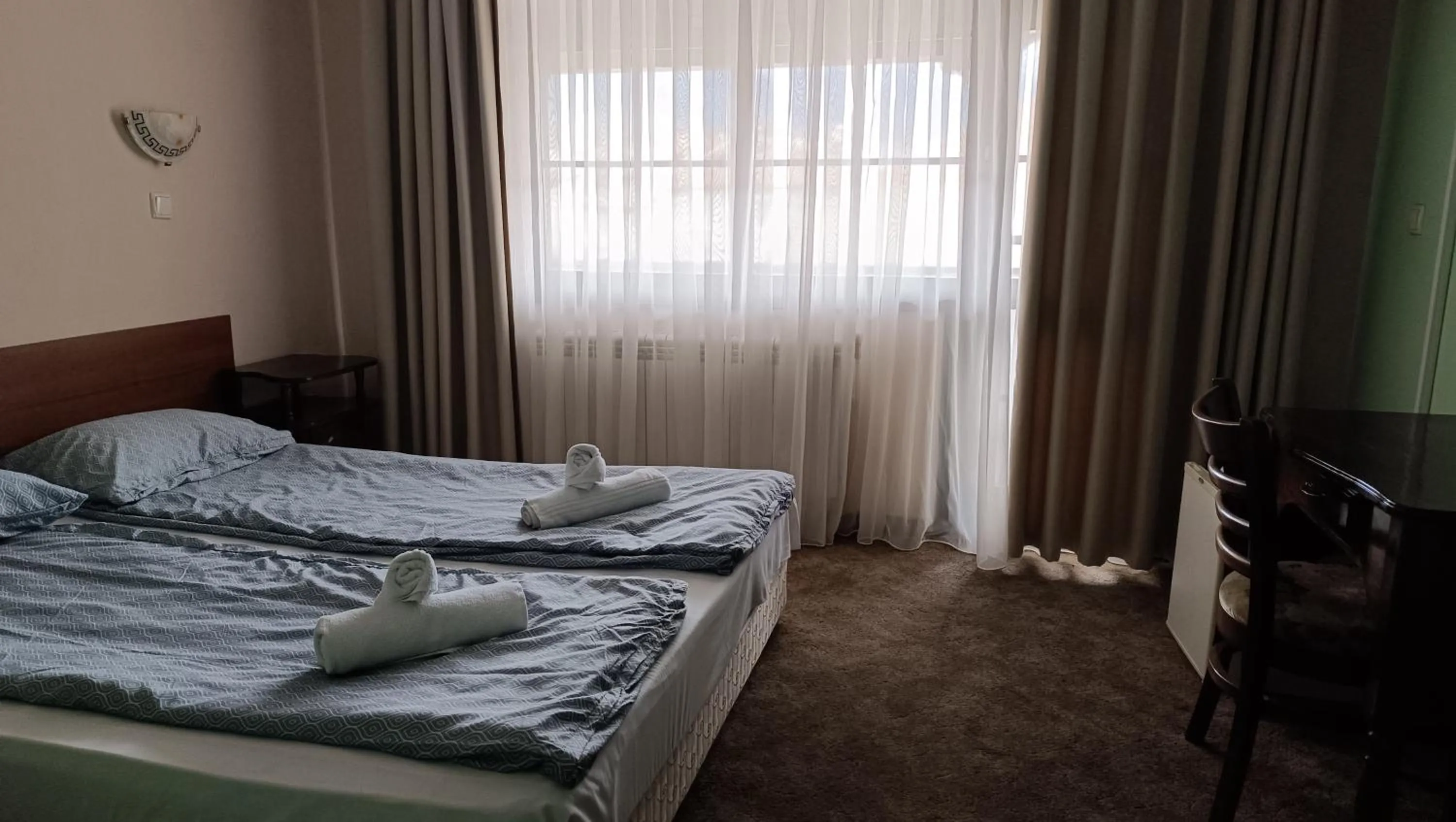 Photo of the whole room, Bed in Hotel St. George Pobedonosets