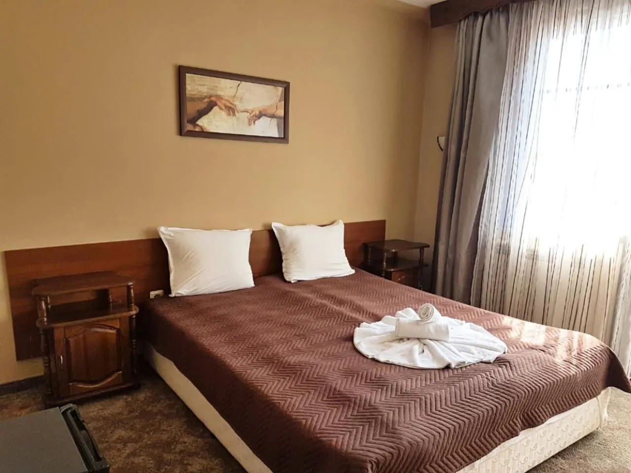 Bed in Hotel St. George Pobedonosets