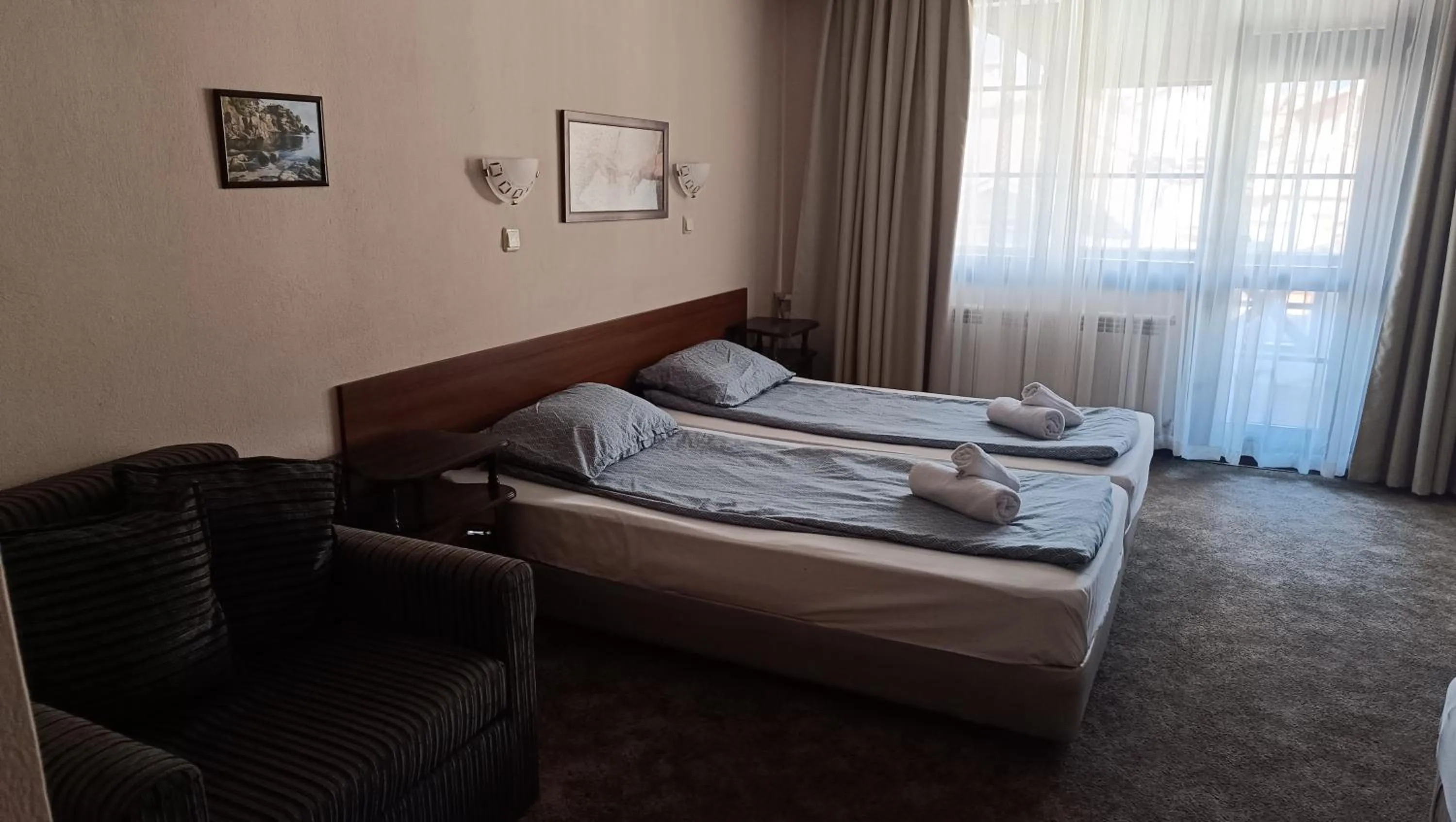 Bed in Hotel St. George Pobedonosets