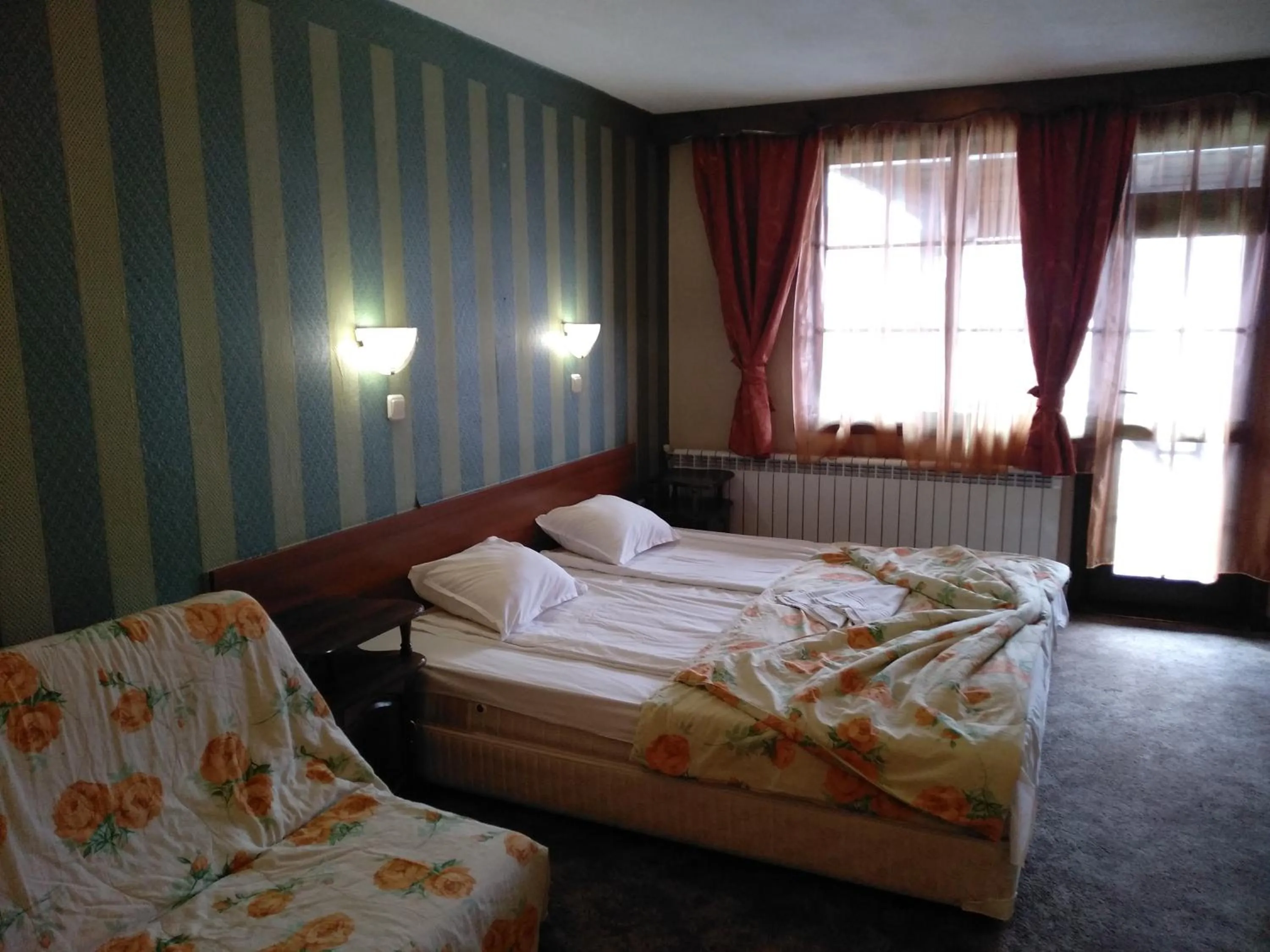 Bed in Hotel St. George Pobedonosets