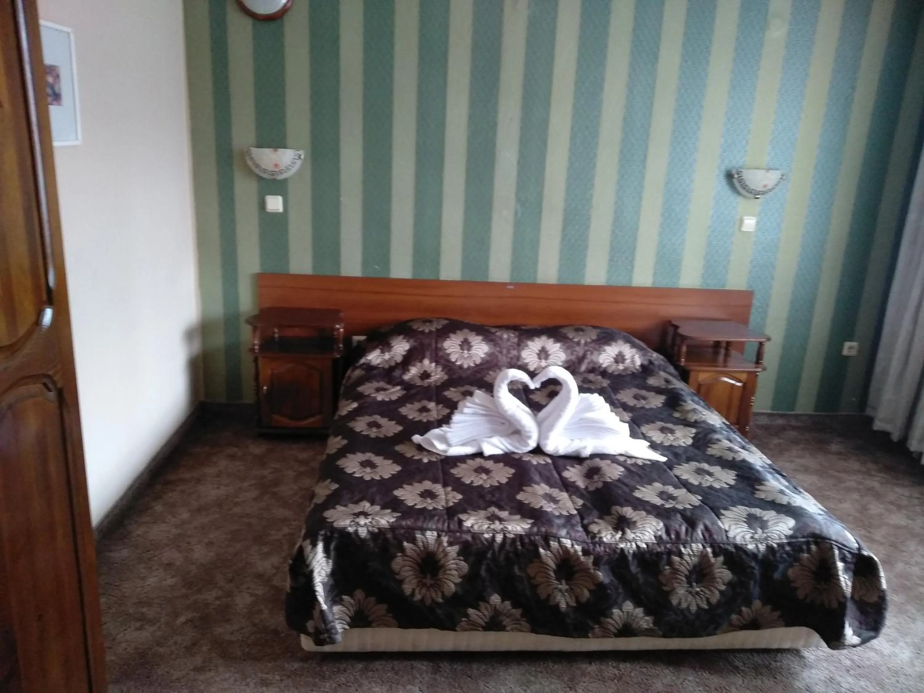 Bed in Hotel St. George Pobedonosets