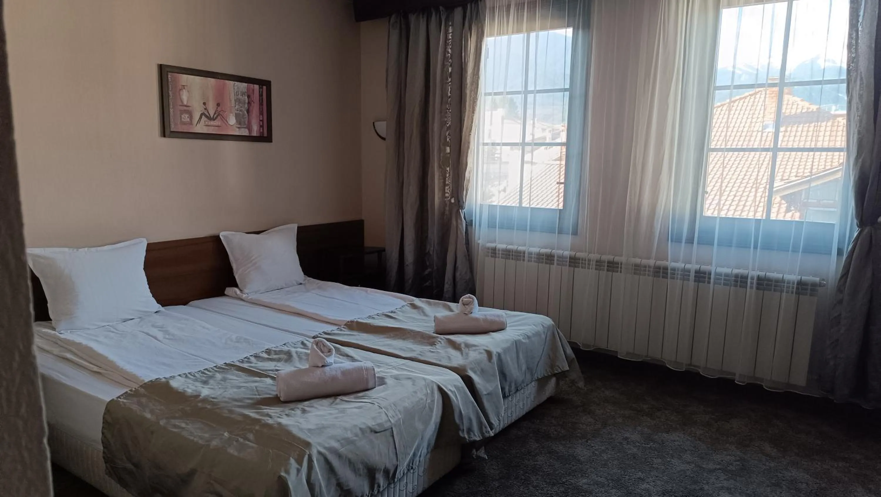 Bed in Hotel St. George Pobedonosets
