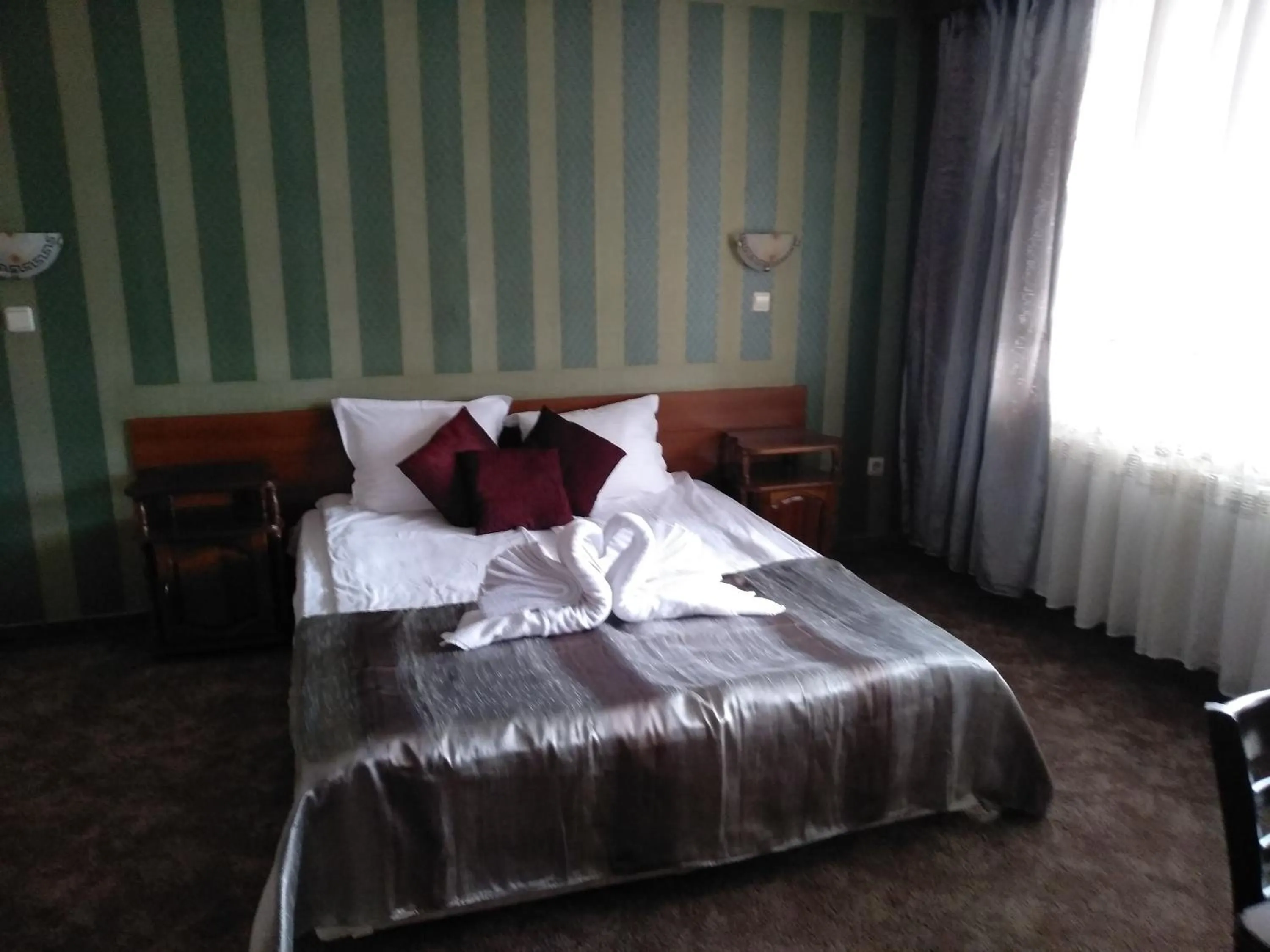 Bed in Hotel St. George Pobedonosets