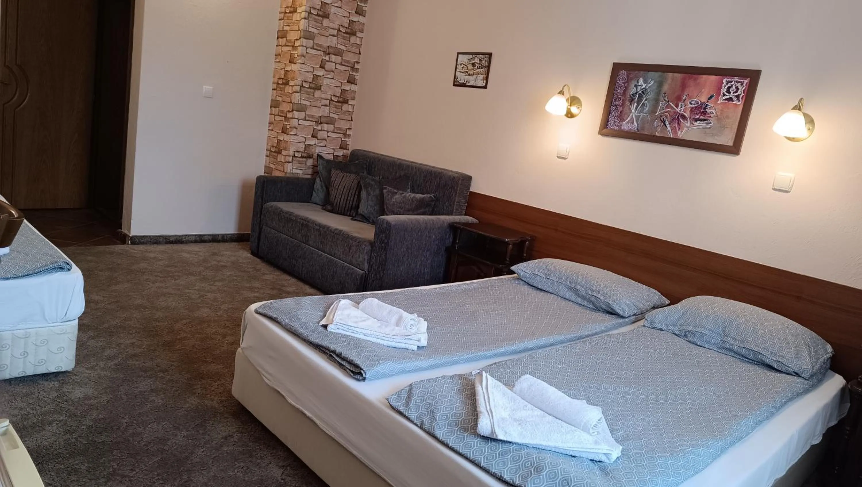 Bed in Hotel St. George Pobedonosets