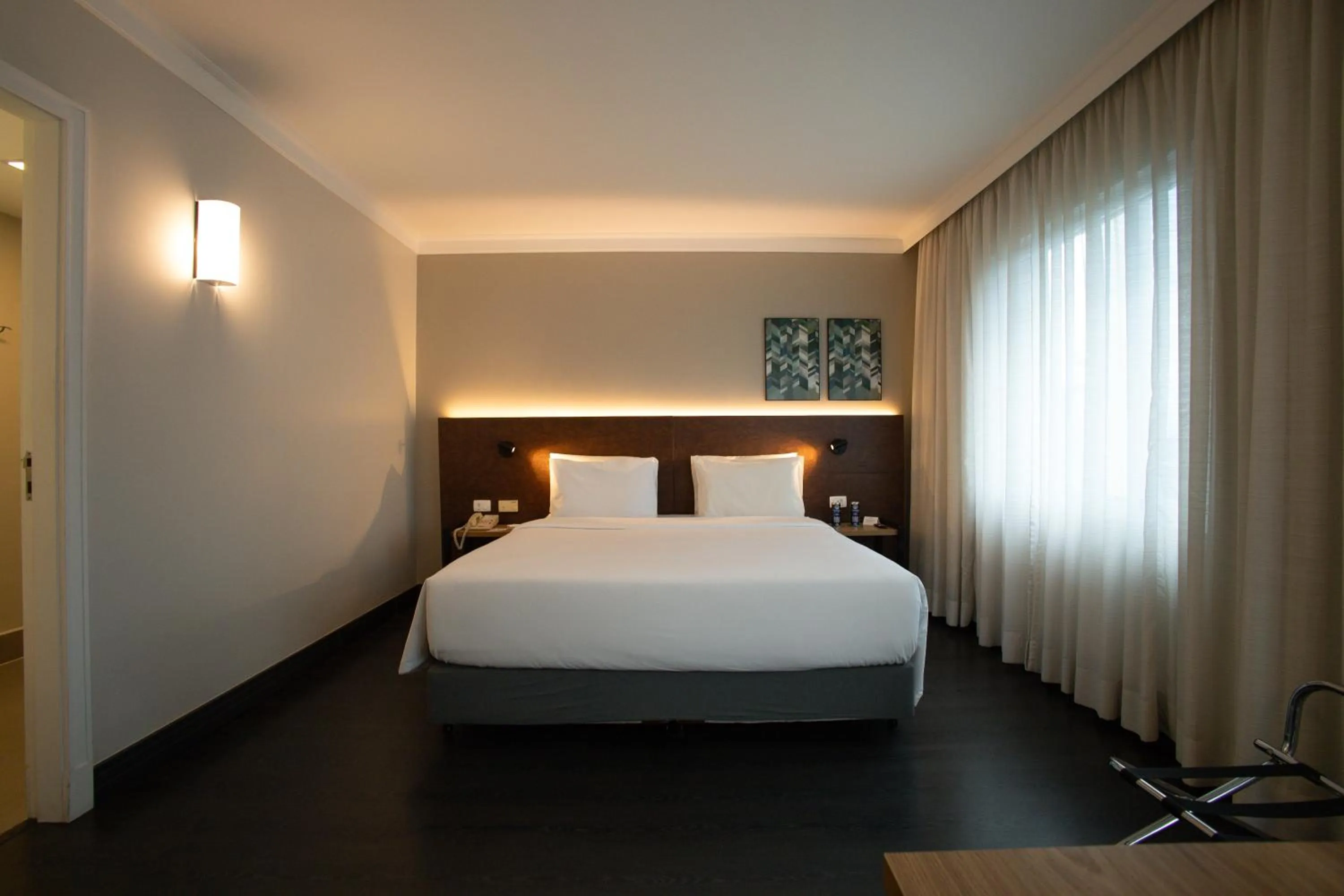 Bed in Park Inn by Radisson Berrini