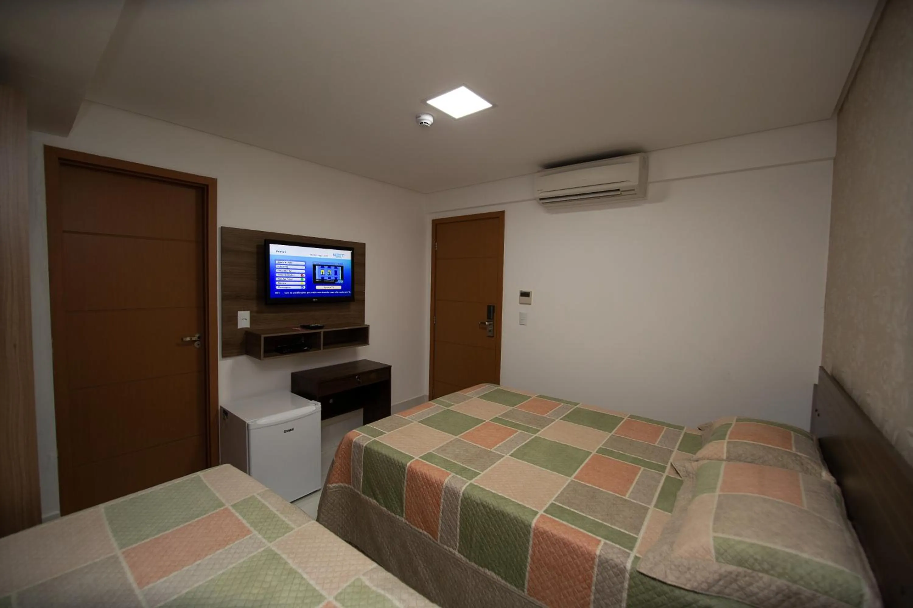 Bed in Tambau Beach Hotel
