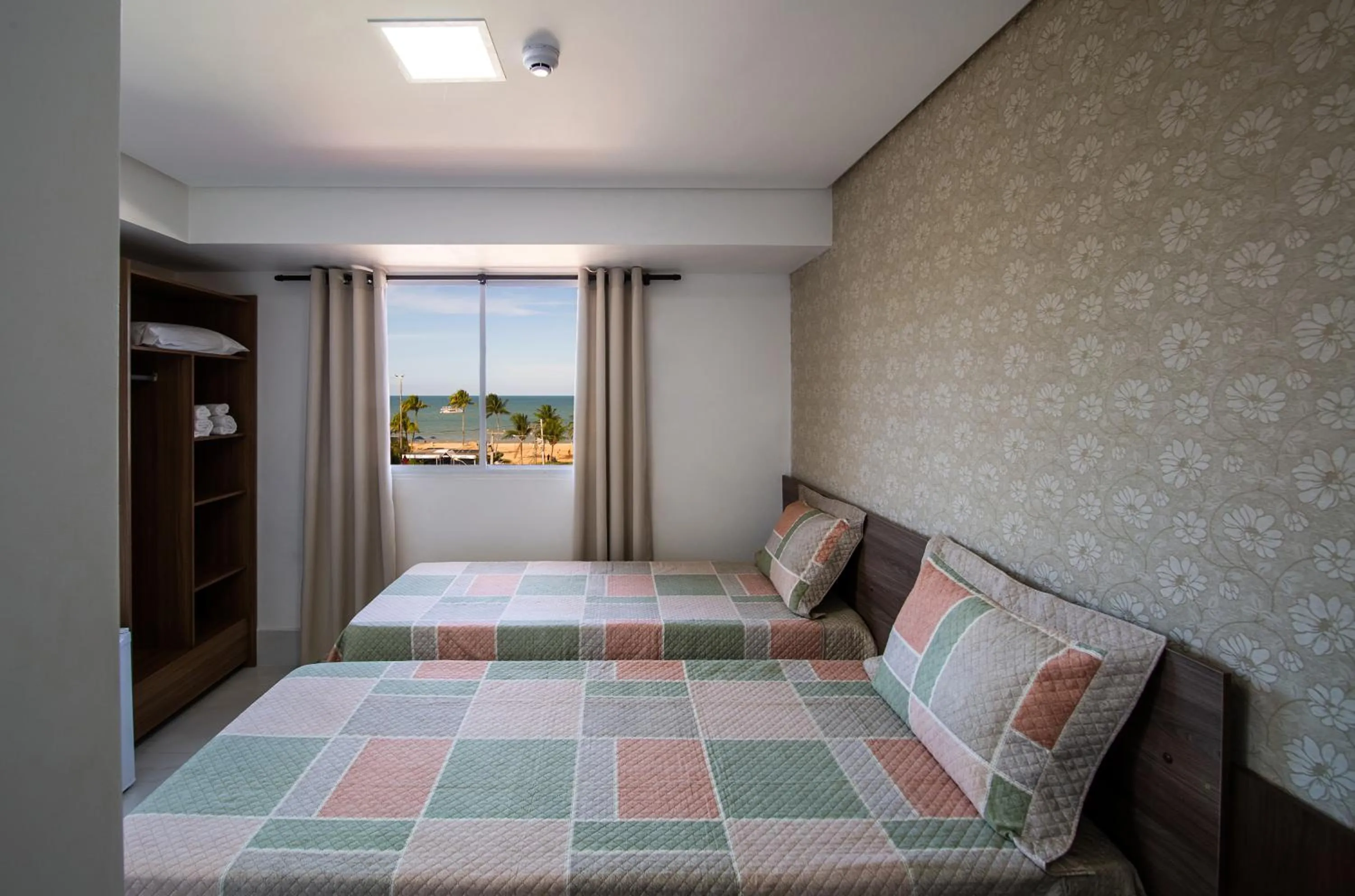 Bed in Tambau Beach Hotel