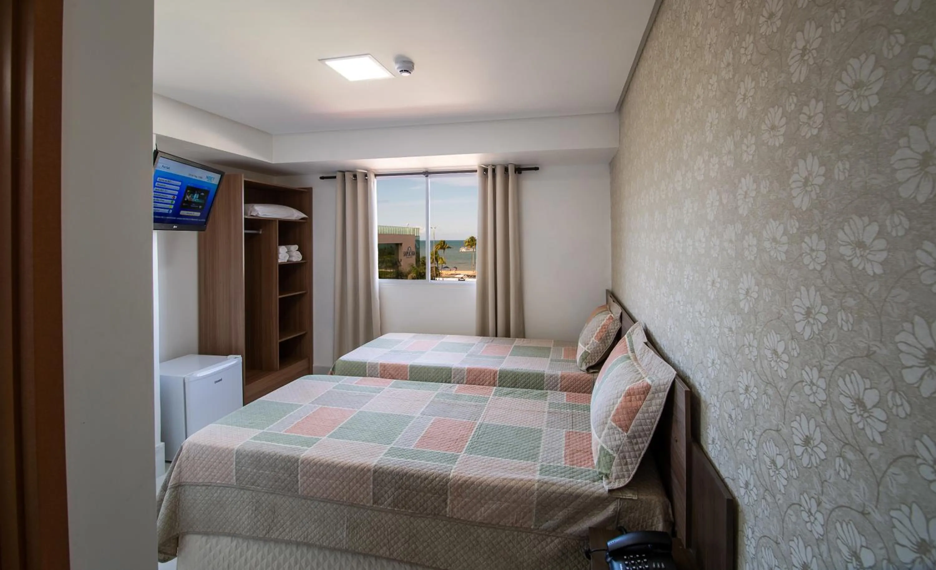 Photo of the whole room, Bed in Tambau Beach Hotel