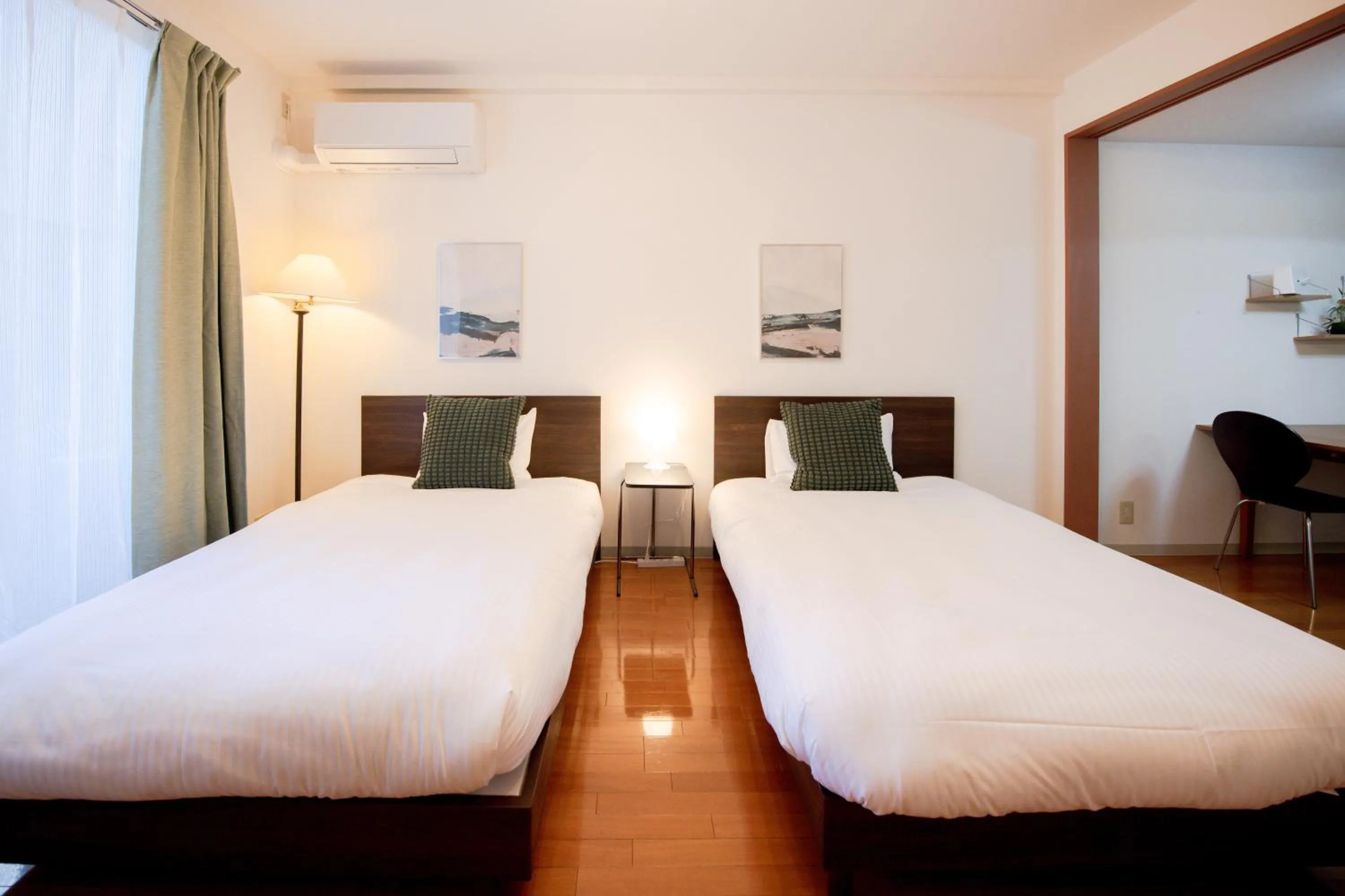 Bed in GuestHouse MIYABI