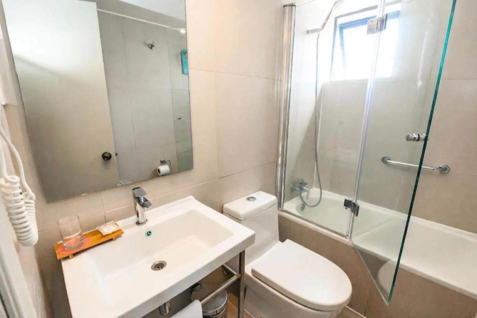 Shower in Studio 56 Apart Hotel by Terrado Iquique