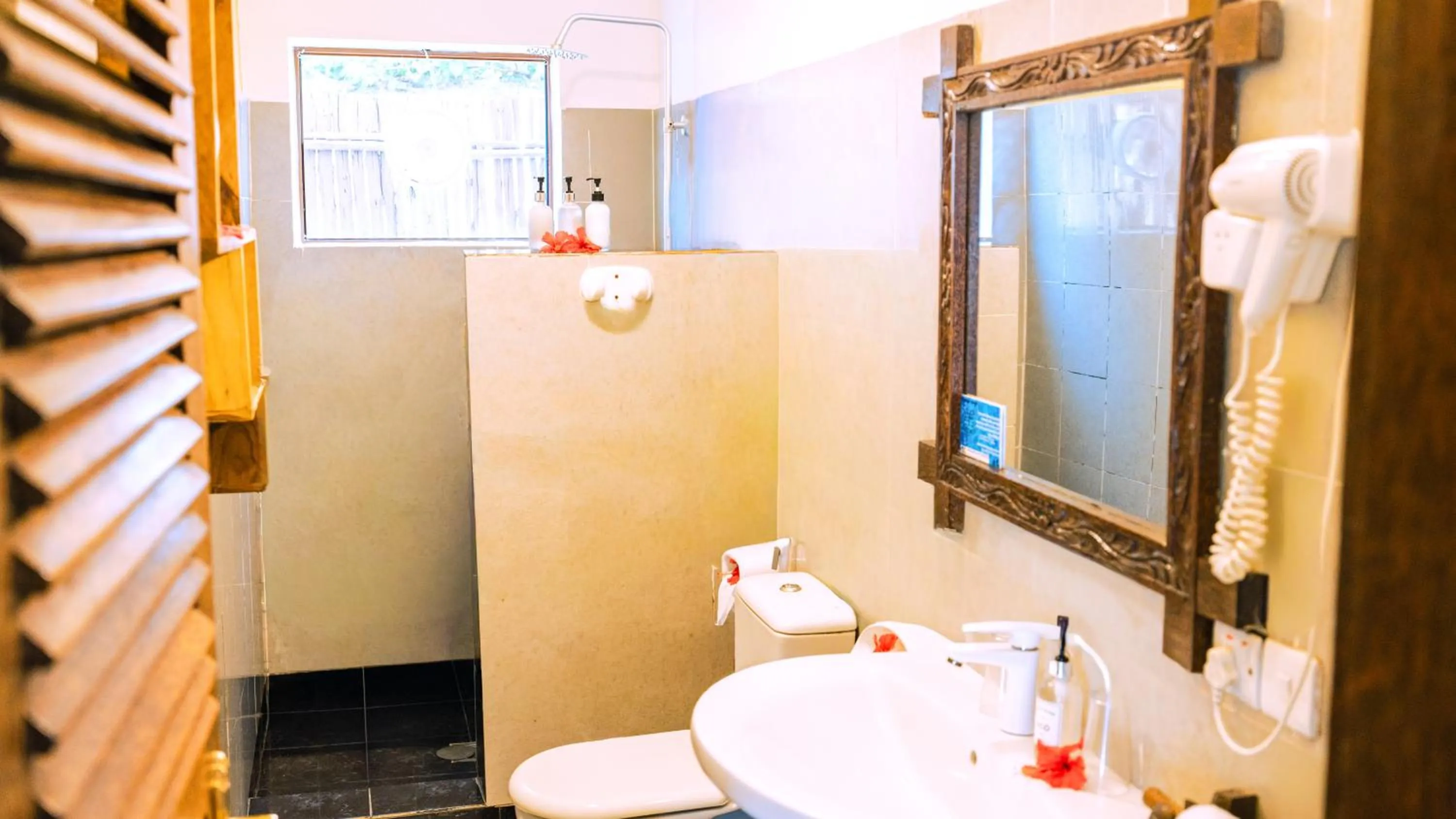 Shower in Paradise Beach Resort & Spa