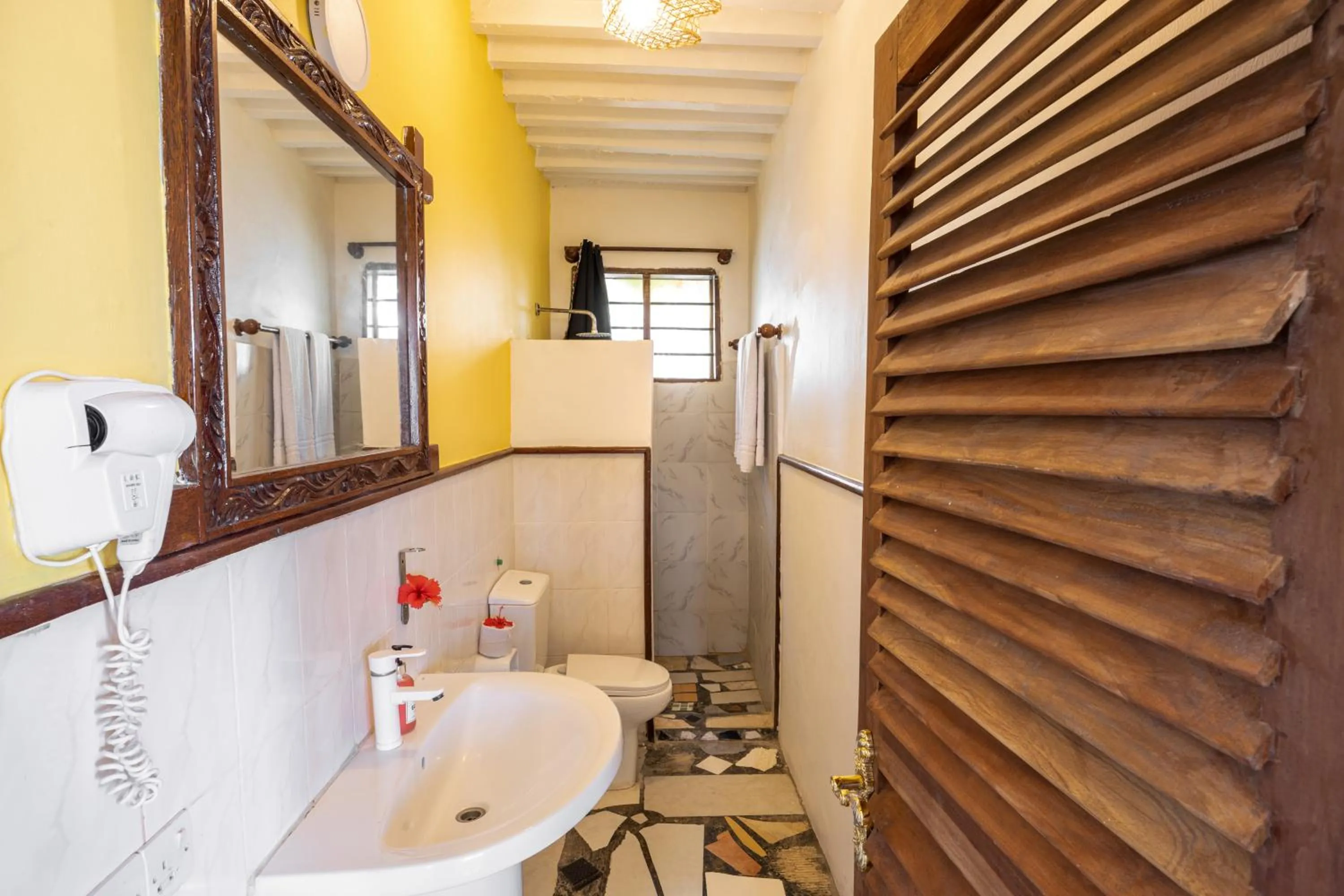 Shower in Paradise Beach Resort & Spa