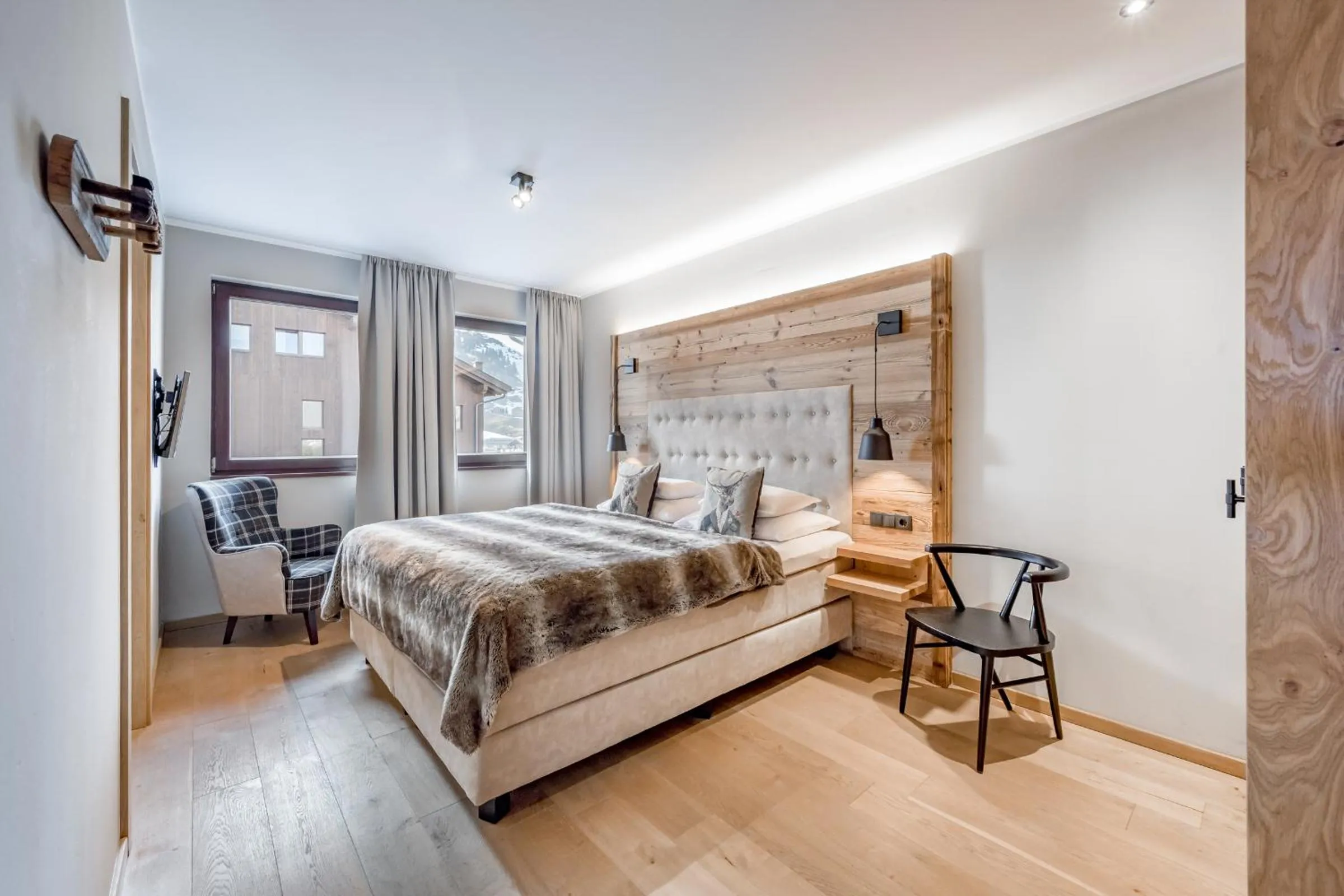 Bedroom, Bed in AlpenParks Hotel & Apartment Arlberg Warth mit Pool