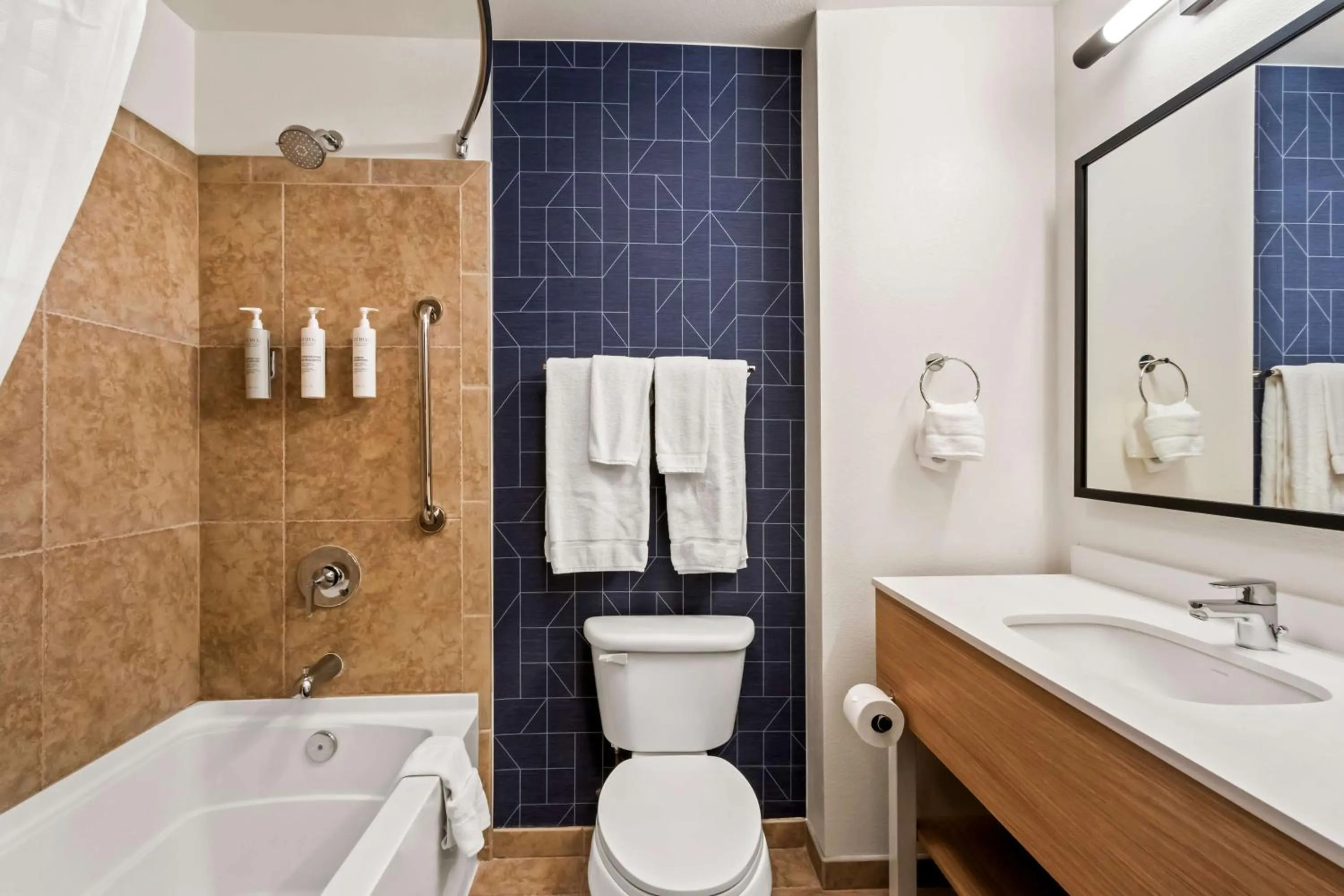 Bathroom in Legacy Inn & Suites