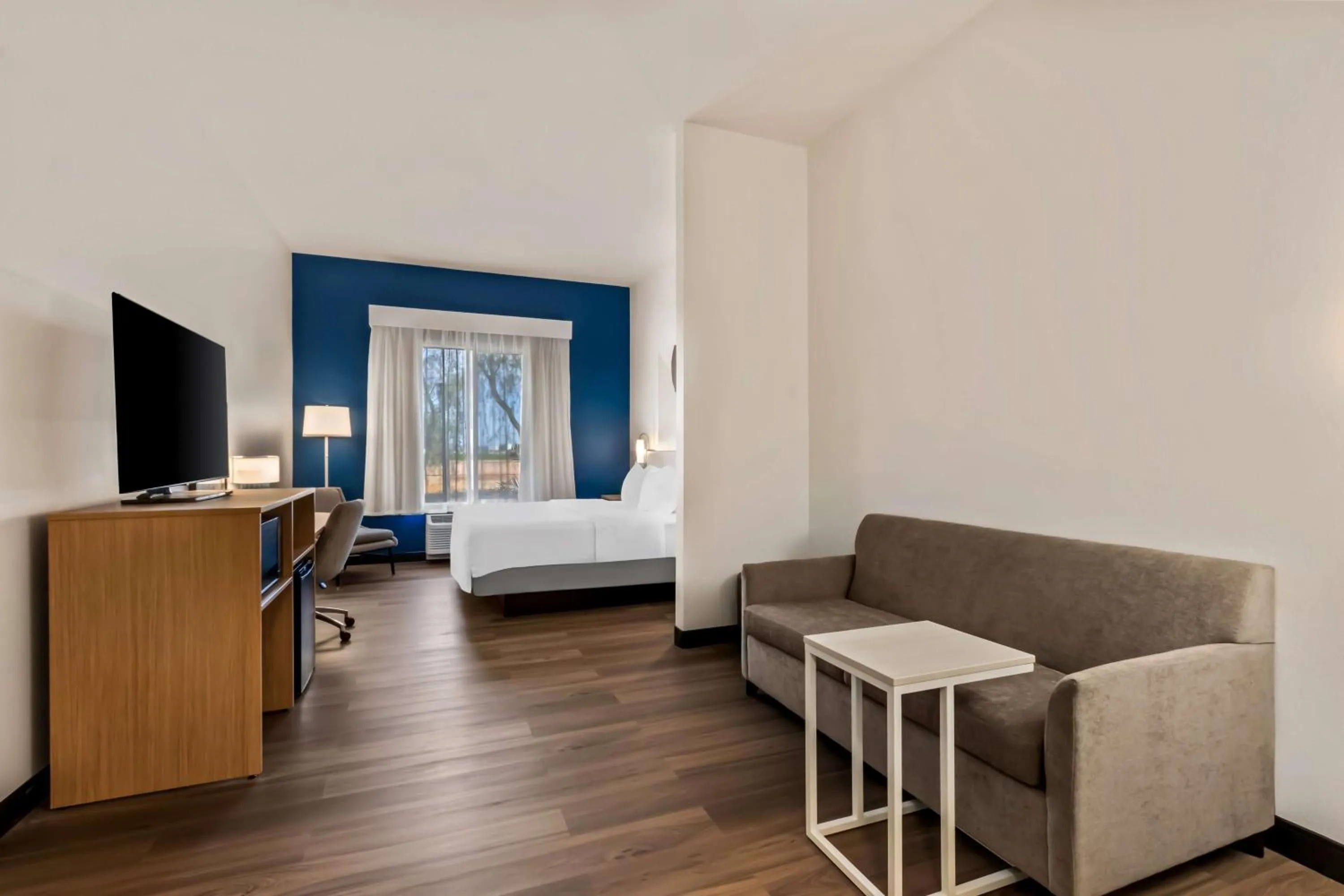 Living room, Bed in Spark by Hilton Phoenix East Mesa