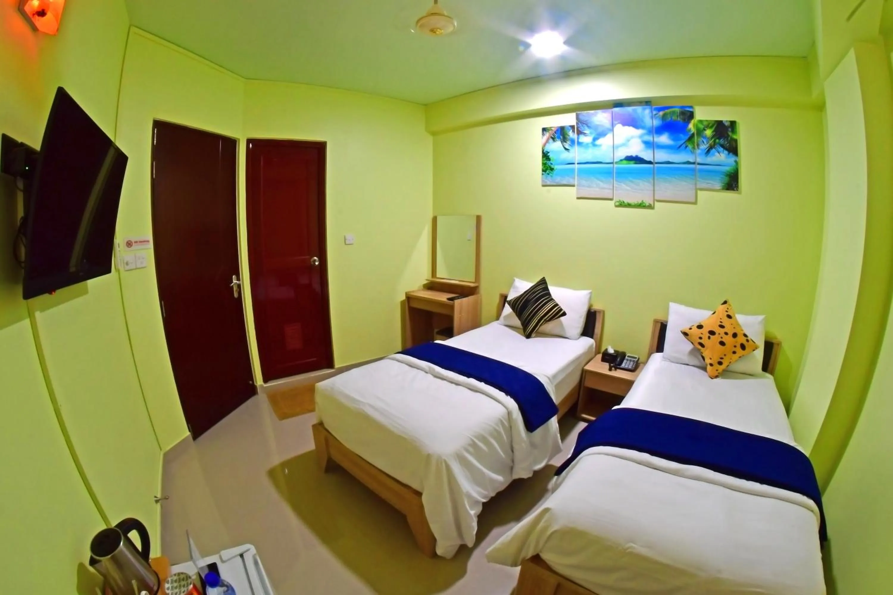 Photo of the whole room, Bed in Tourist Inn