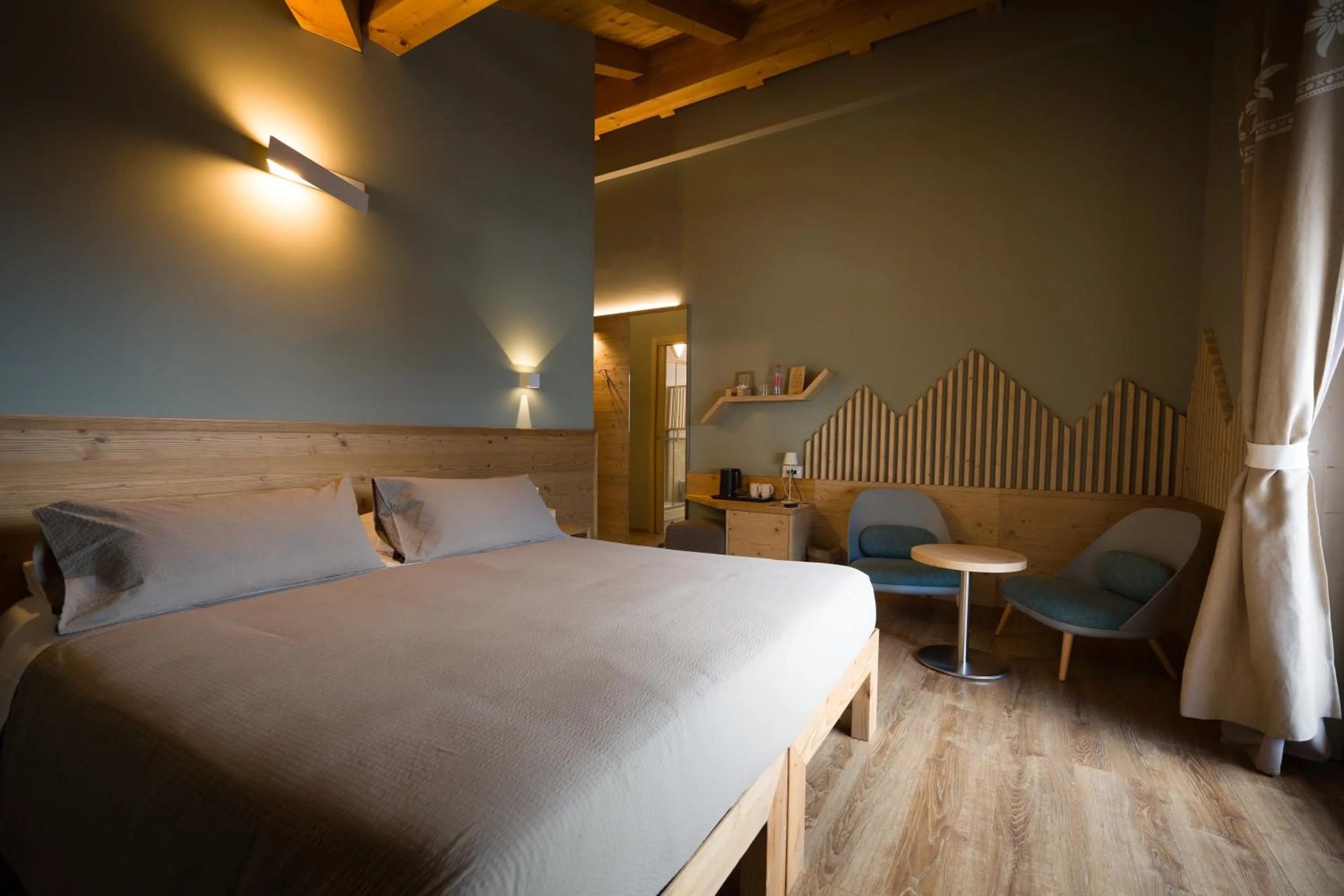 Bedroom, Bed in Alpen Chalet - Charme Mountain Hotel -