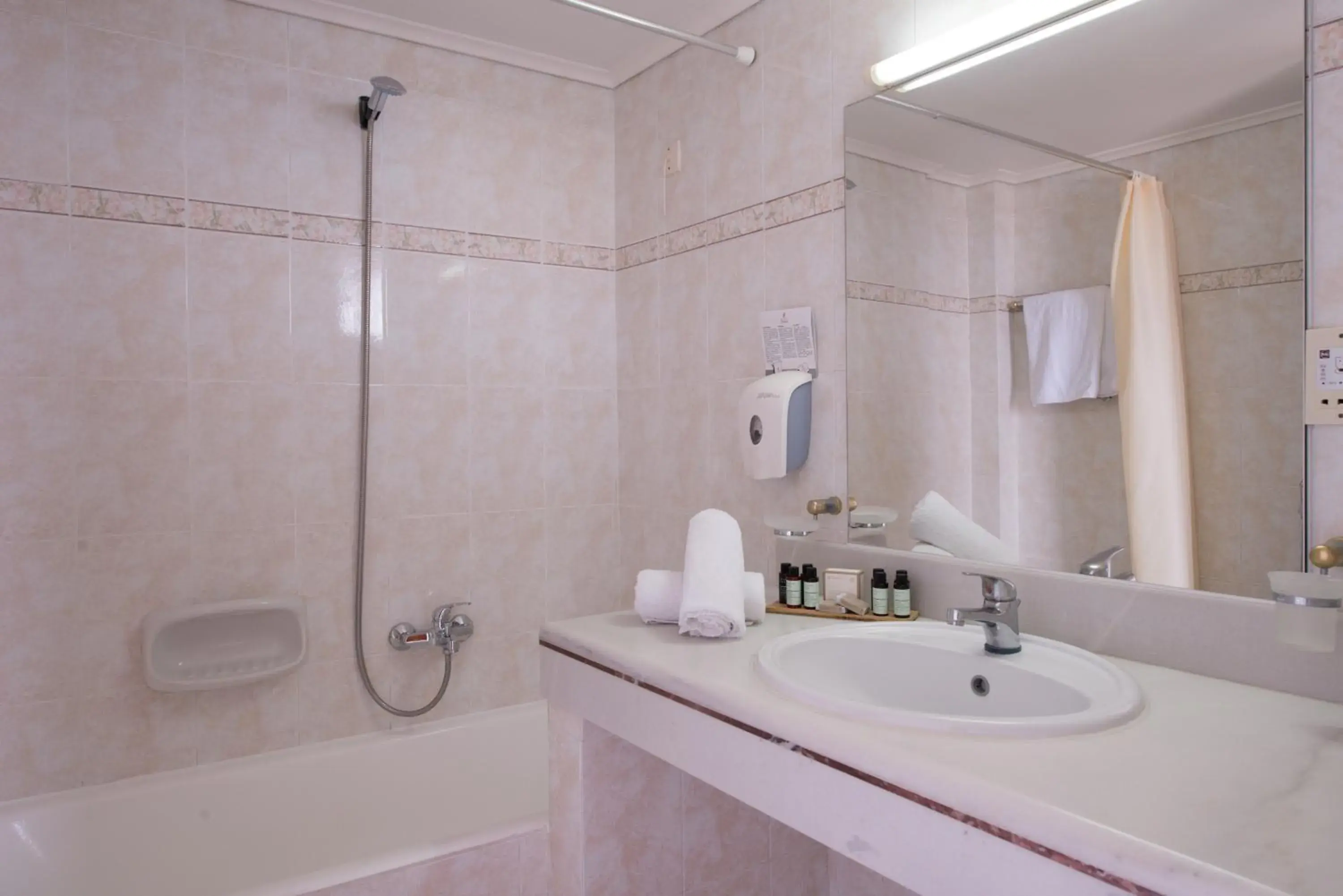 Bathroom in Athina Palace Resort & Spa Bathroom in Athina Palace Resort & Spa