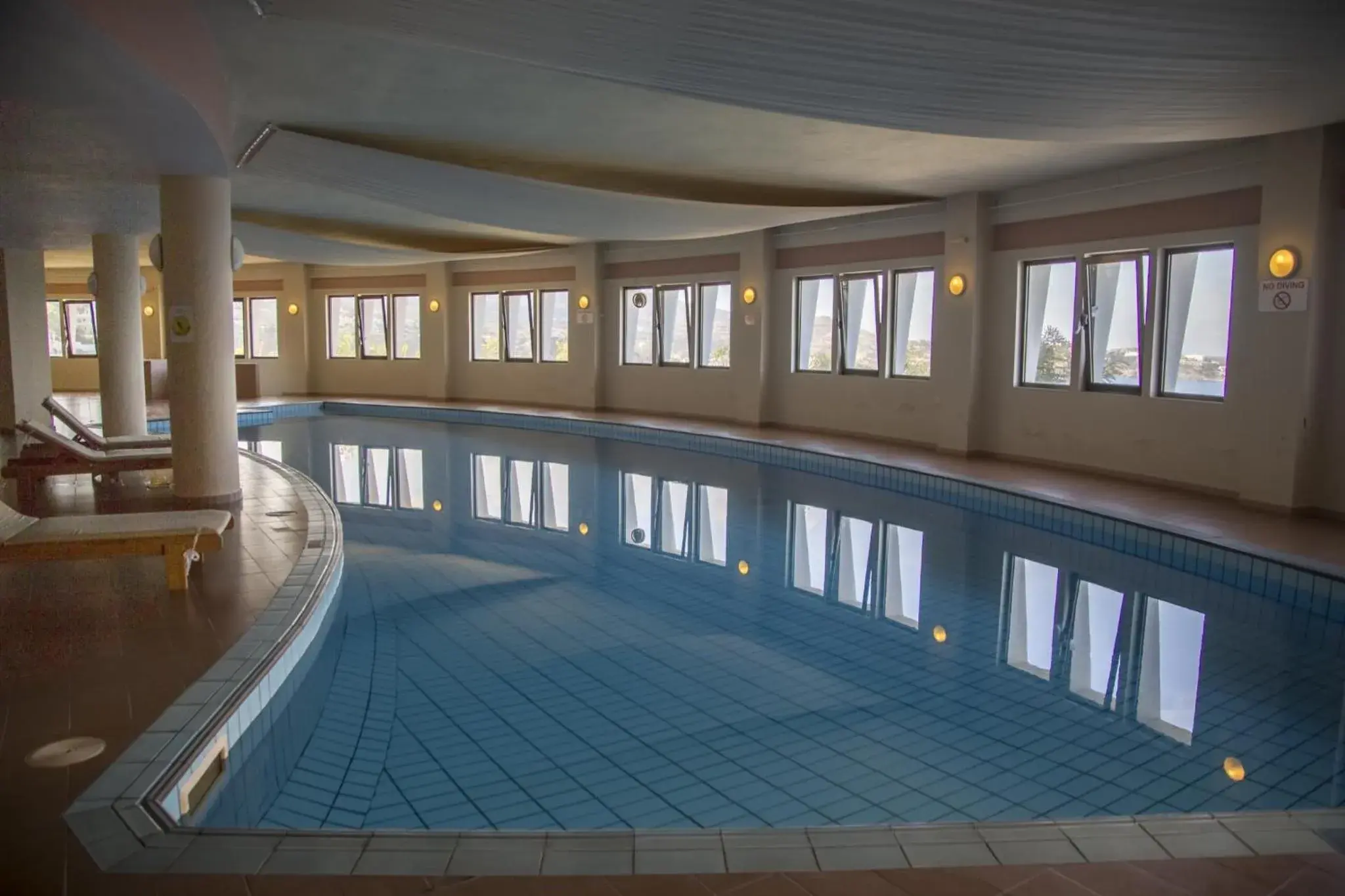 Swimming pool in Athina Palace Resort & Spa Swimming pool in Athina Palace Resort & Spa