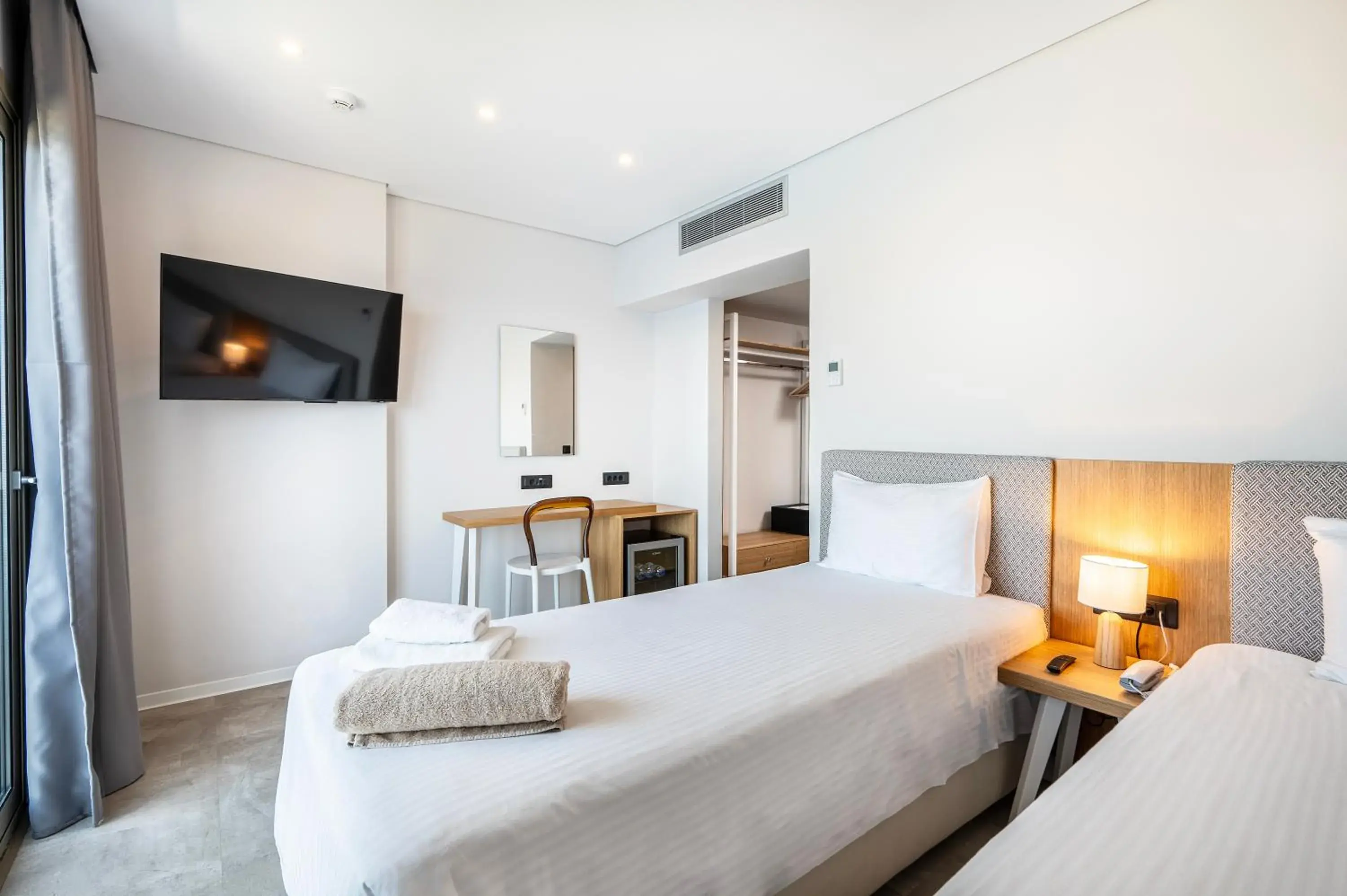 Bedroom, Bed in Athina Palace Resort & Spa Bedroom, Bed in Athina Palace Resort & Spa