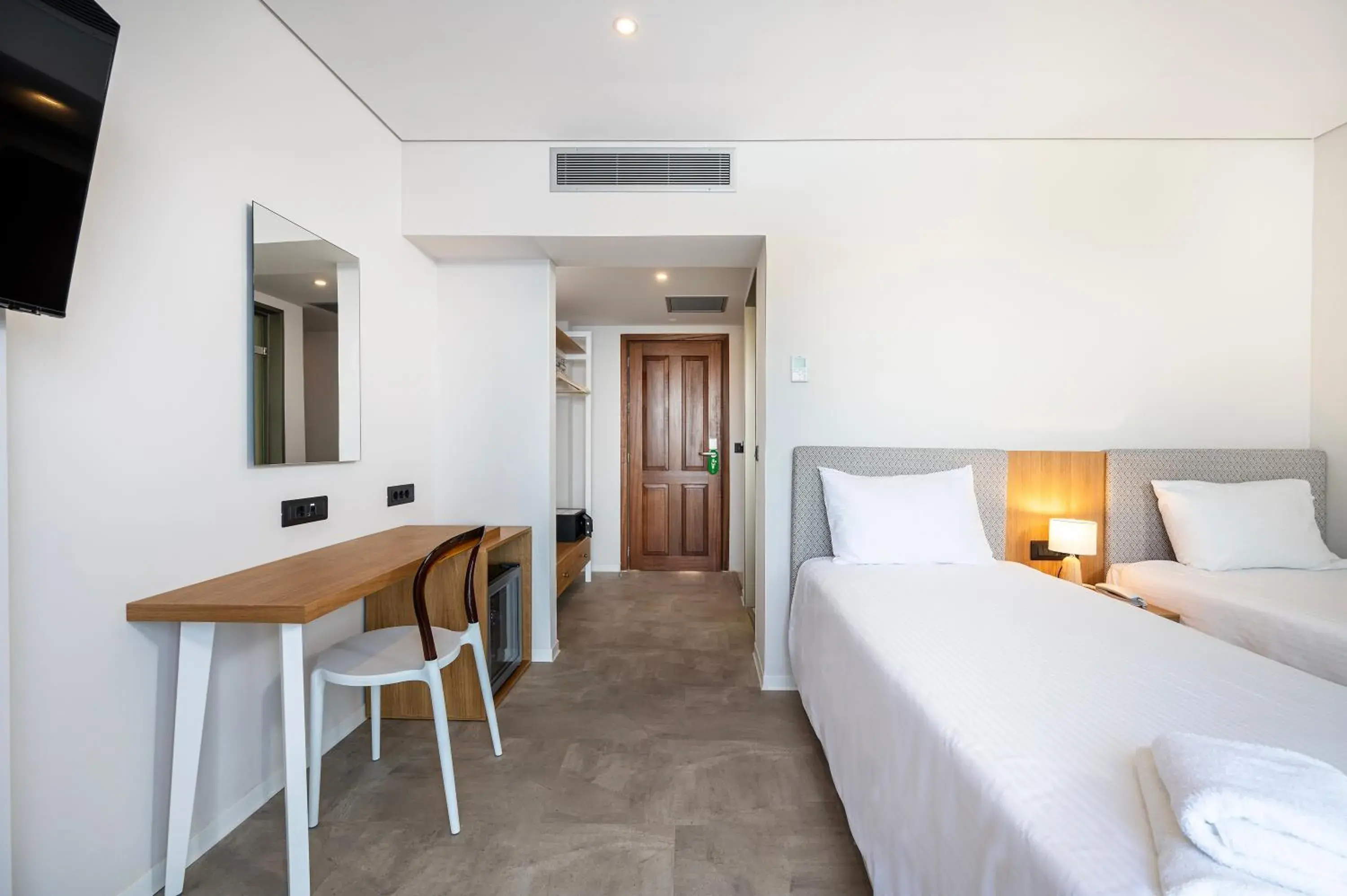 Bedroom, Bed in Athina Palace Resort & Spa Bedroom, Bed in Athina Palace Resort & Spa