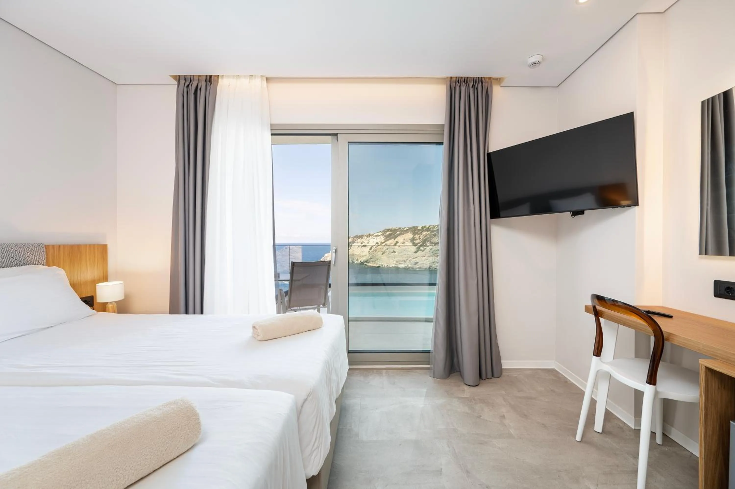 Sea view, Bed in Athina Palace Resort & Spa