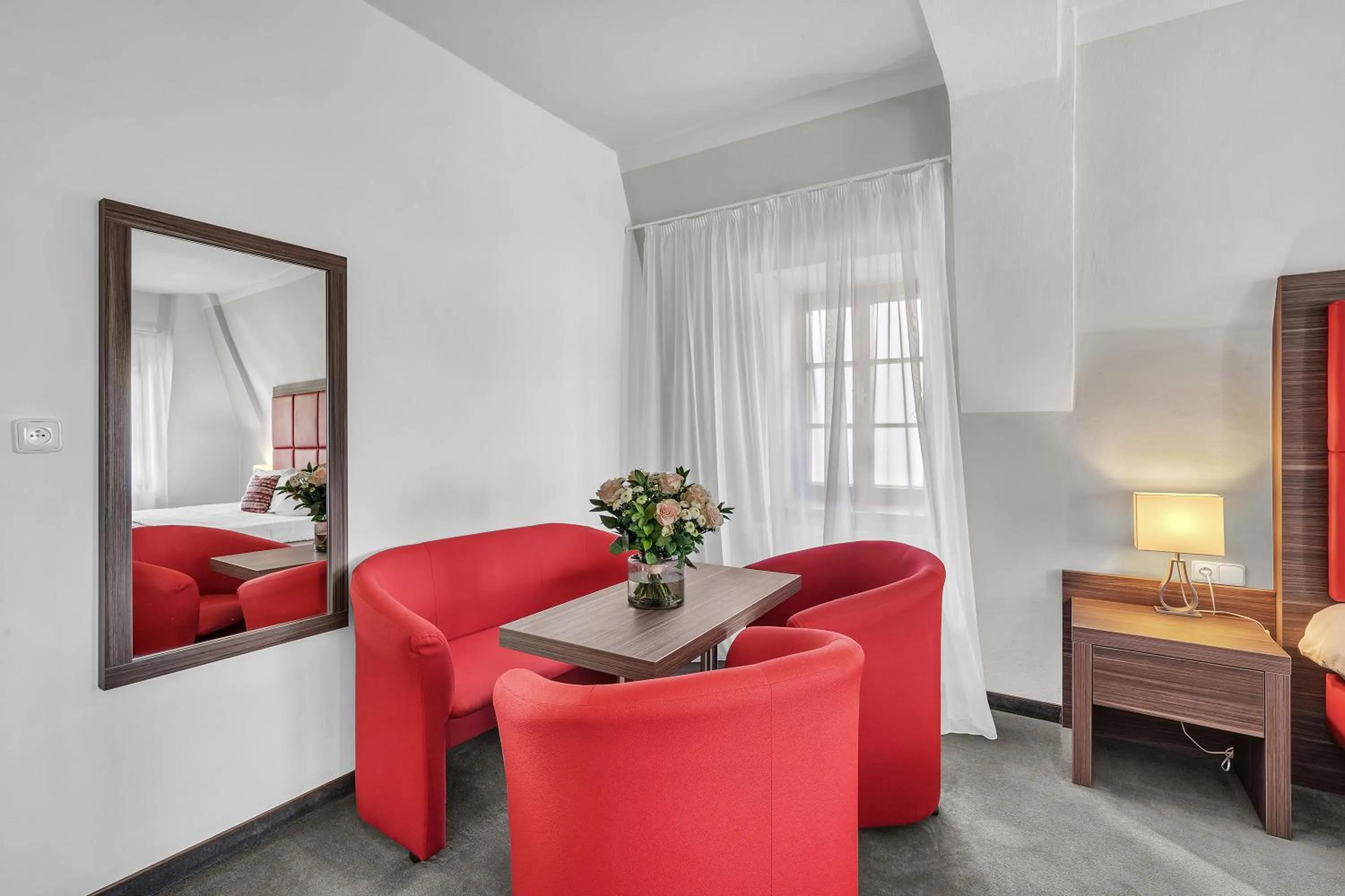 Seating area, Bed in Hotel Nelly Kellys