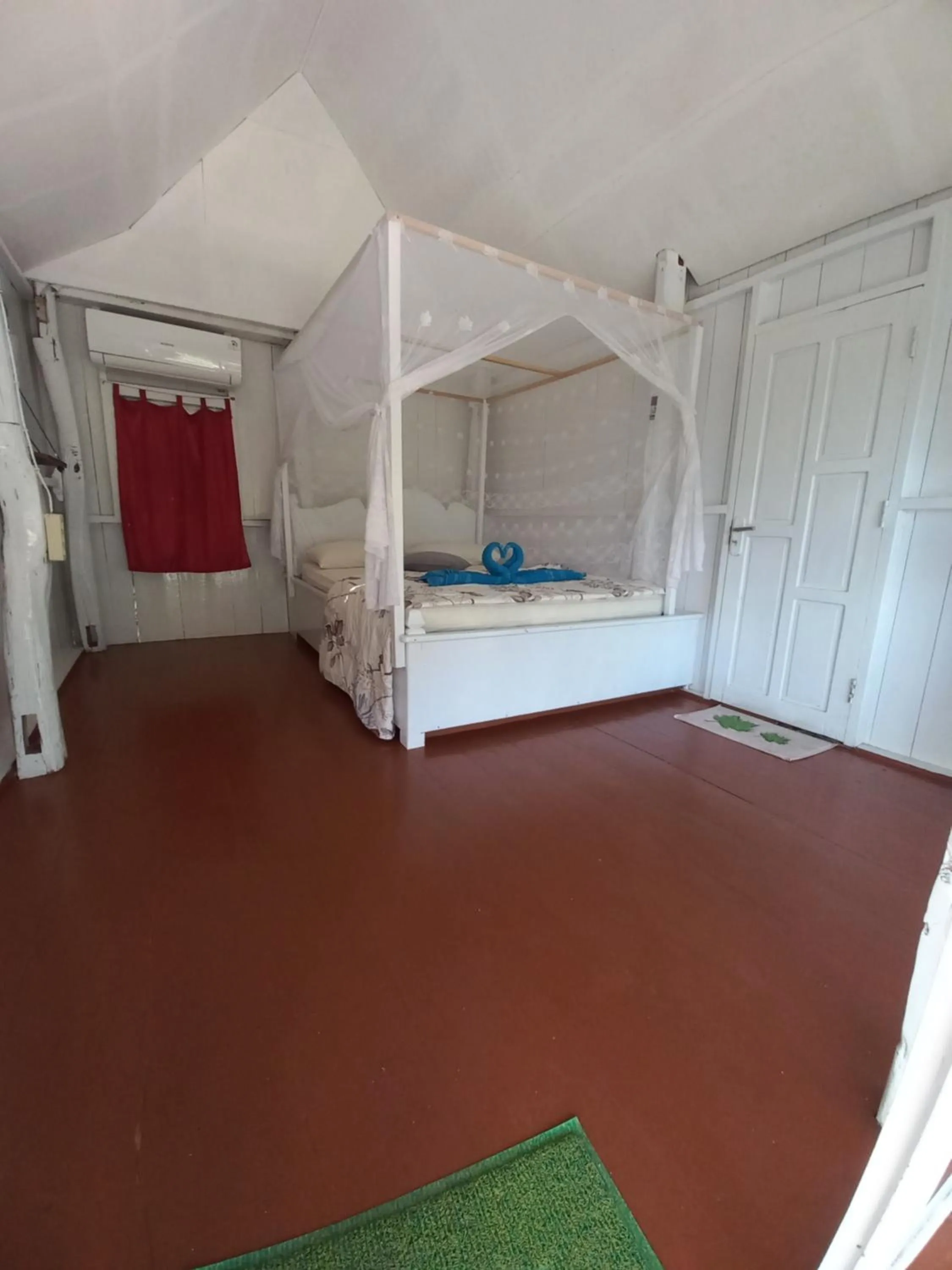 Bed in Scuba Republic Beach Bungalows