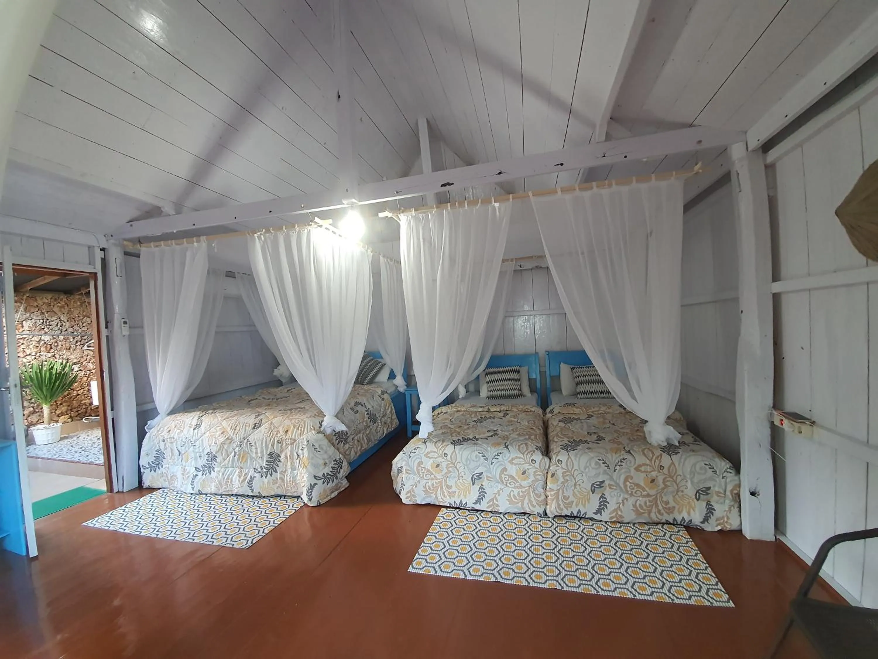 Photo of the whole room, Bed in Scuba Republic Beach Bungalows