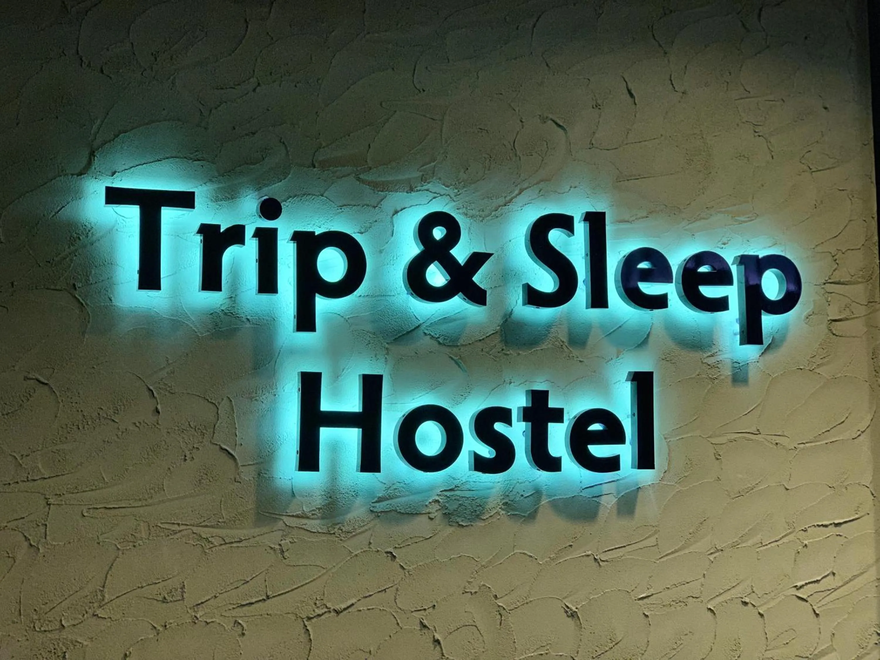 Property logo or sign in Trip &amp; Sleep Hostel