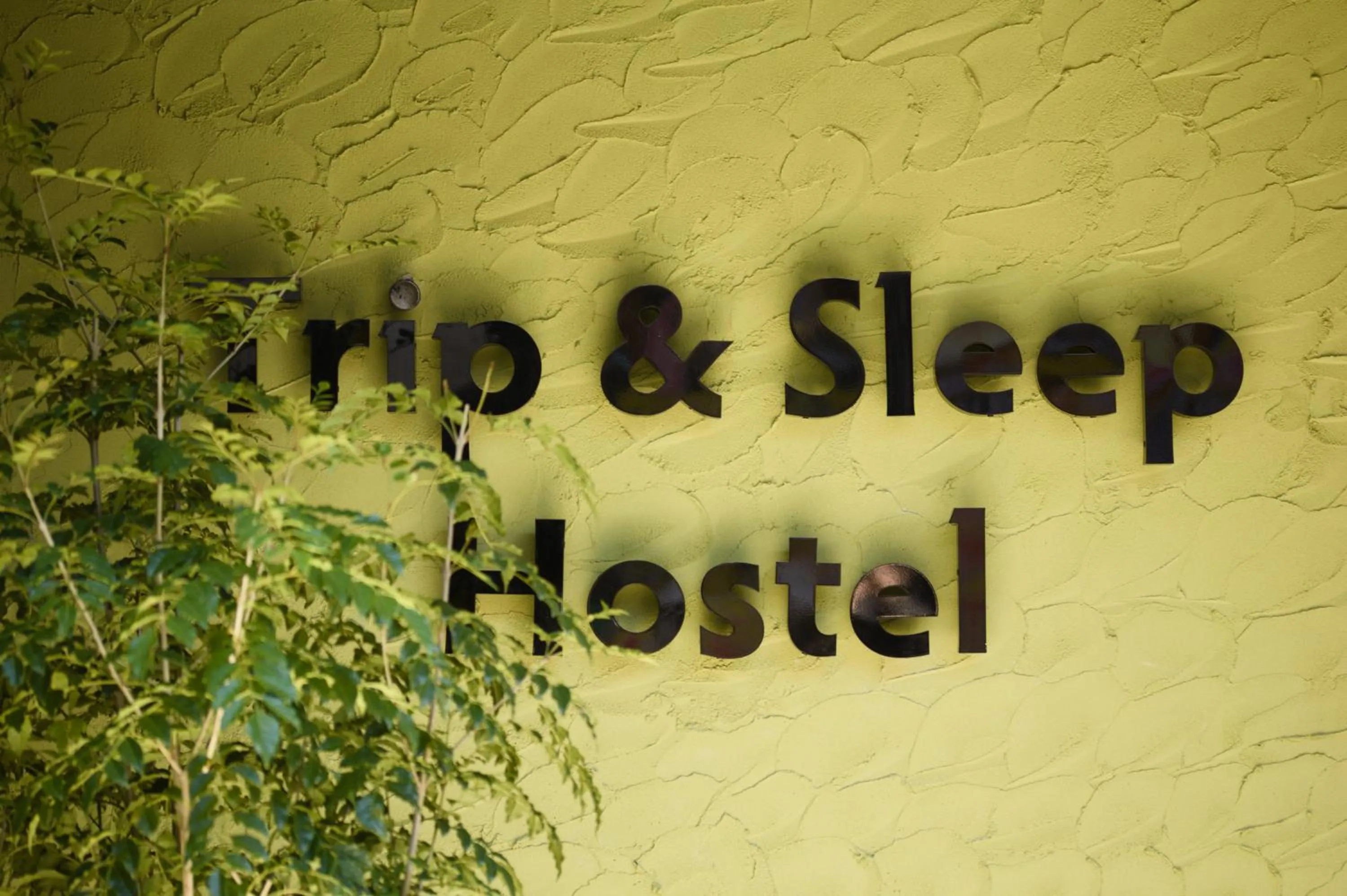 Property logo or sign in Trip &amp; Sleep Hostel