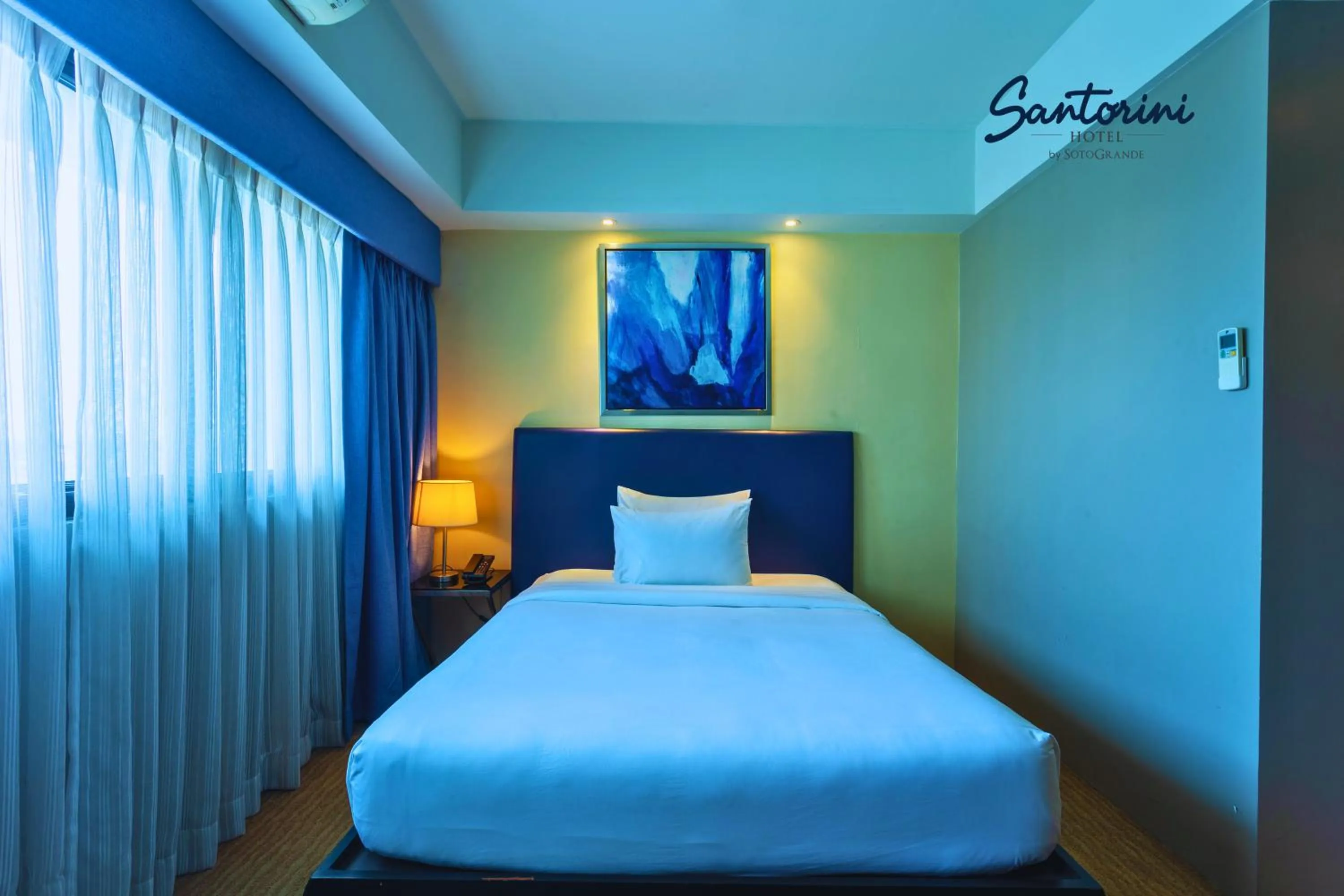 Bed in Santorini Hotel