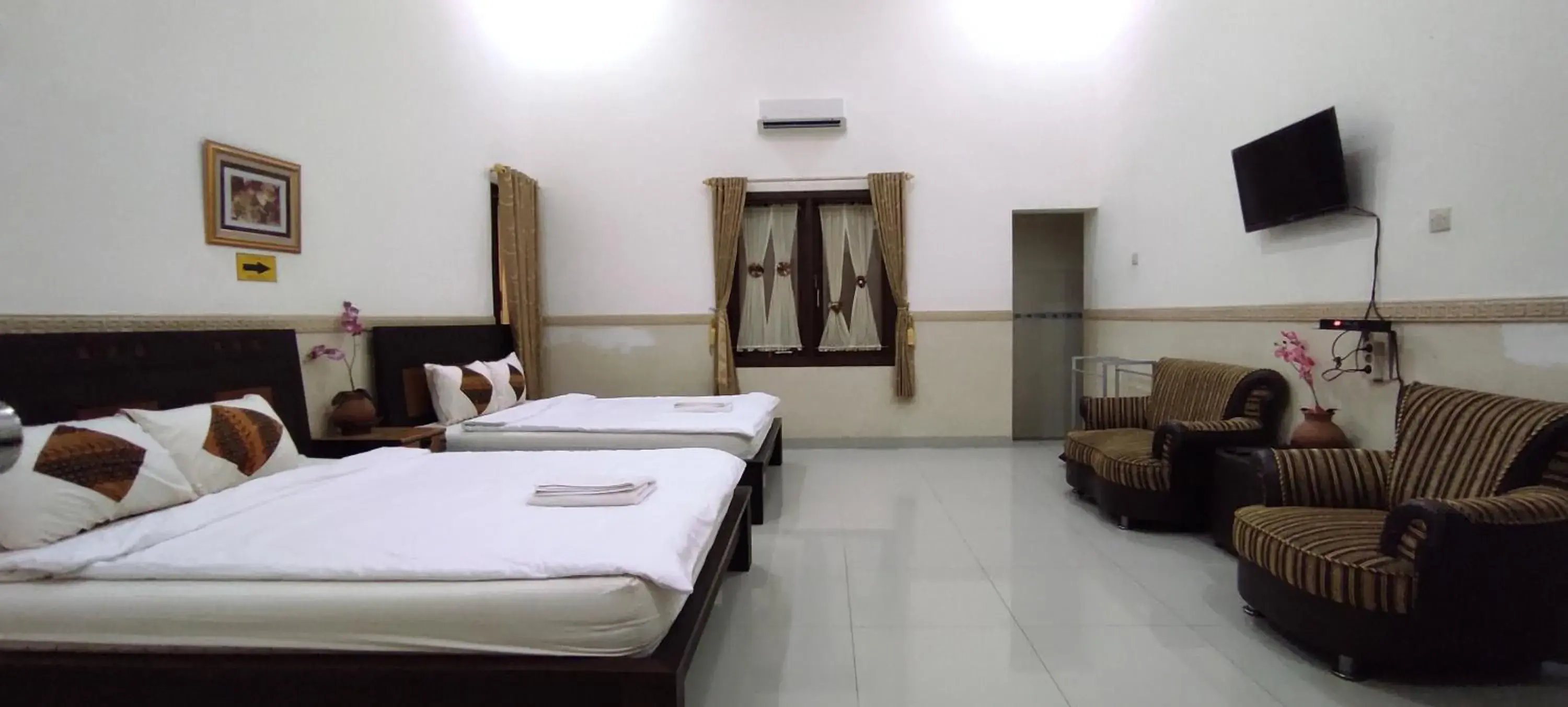 Bed in Ndalem Katong Guest House Ponorogo Bed in Ndalem Katong Guest House Ponorogo