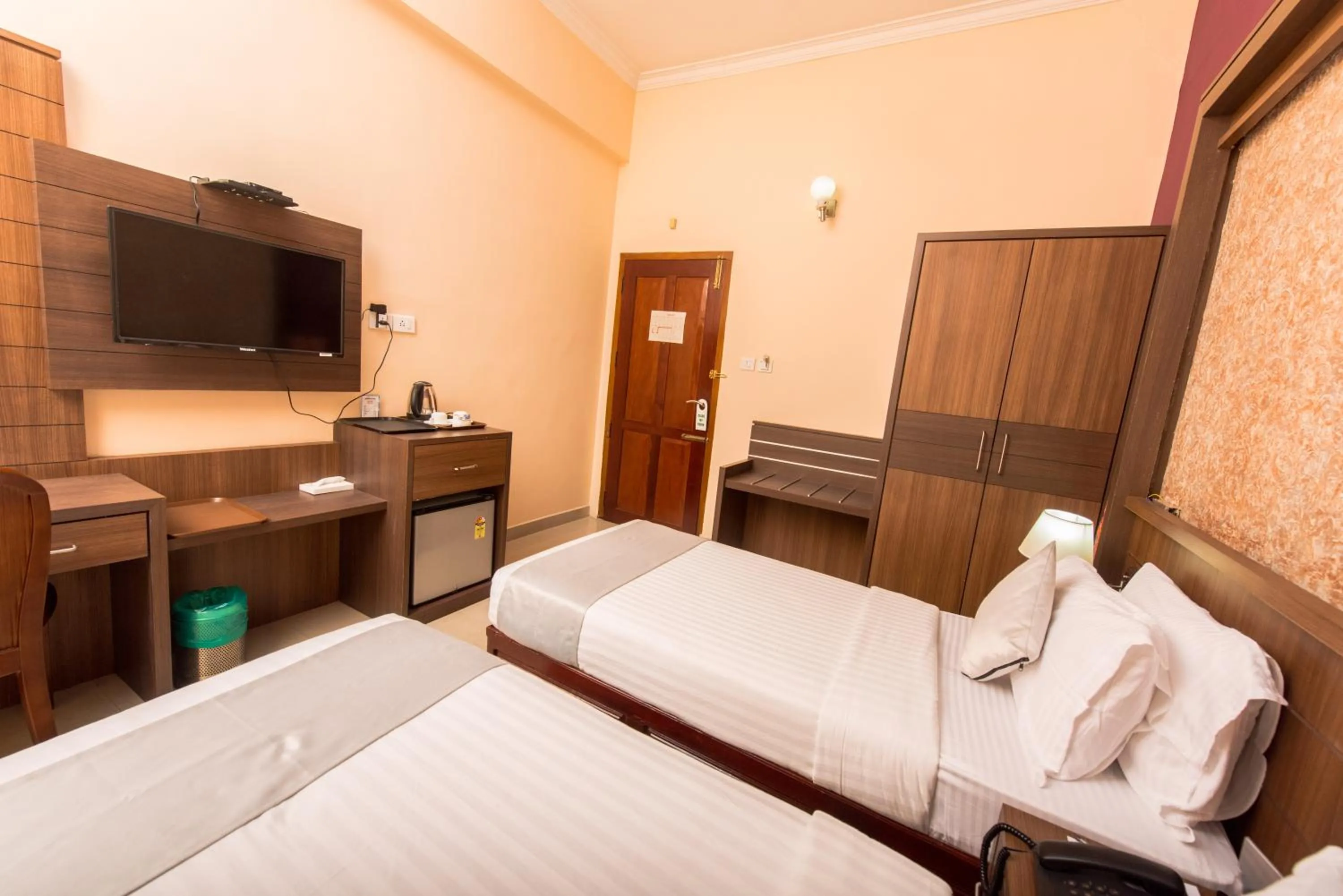 Bed in Kallada Golden Hotel