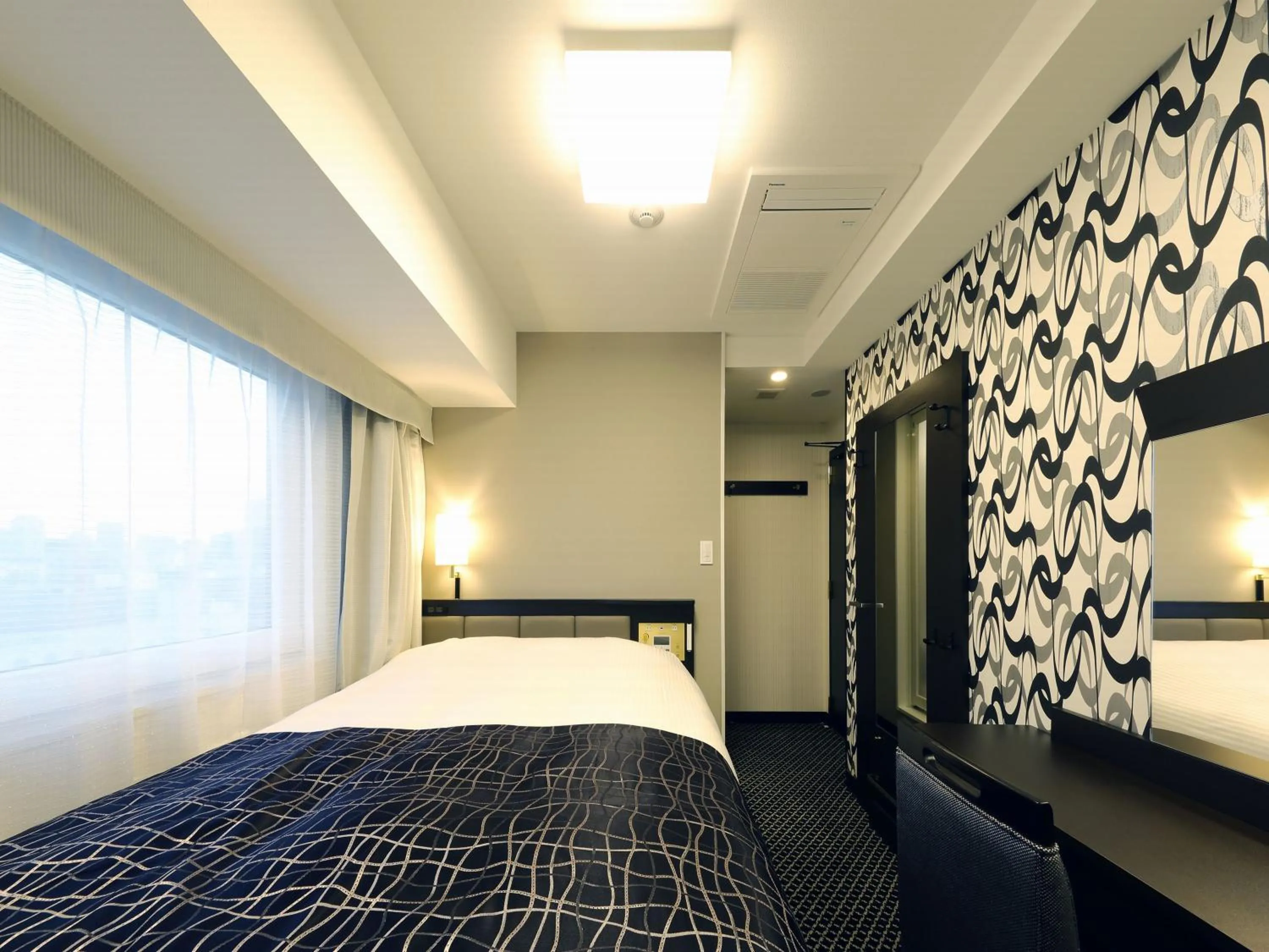 Photo of the whole room, Bed in APA Hotel Ueno Inaricho Ekikita