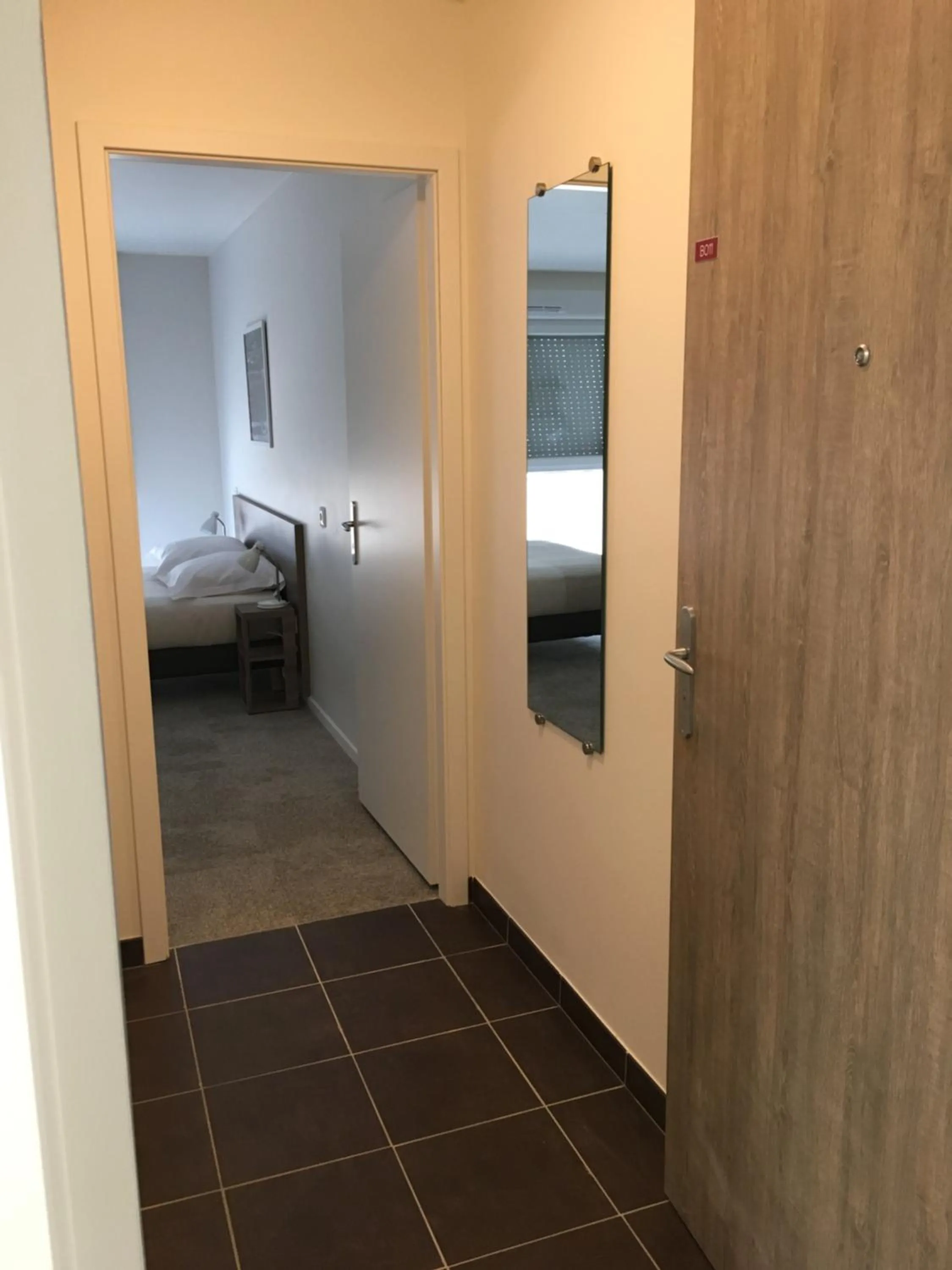 Bed in Kosy Appart'hôtels Art'&Facts