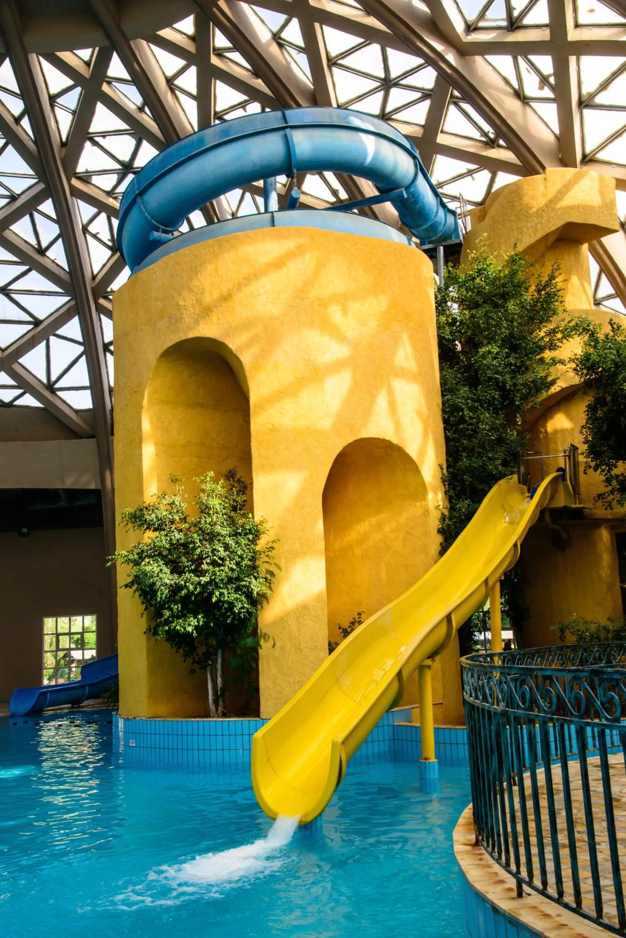 Swimming pool in Suites Hôtel Les Charmilles & Spa