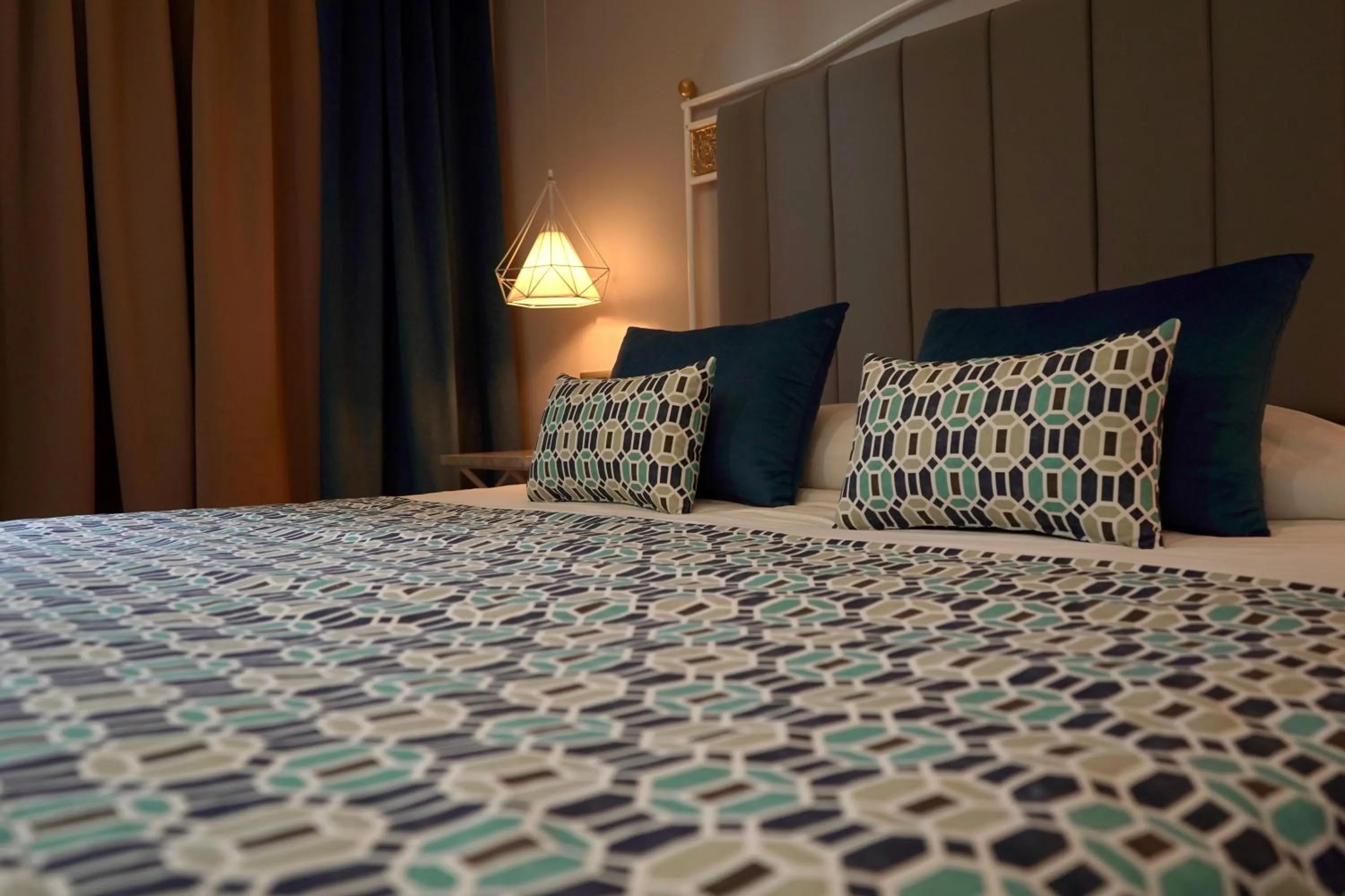 Bedroom, Bed in Suites Hôtel Les Charmilles & Spa