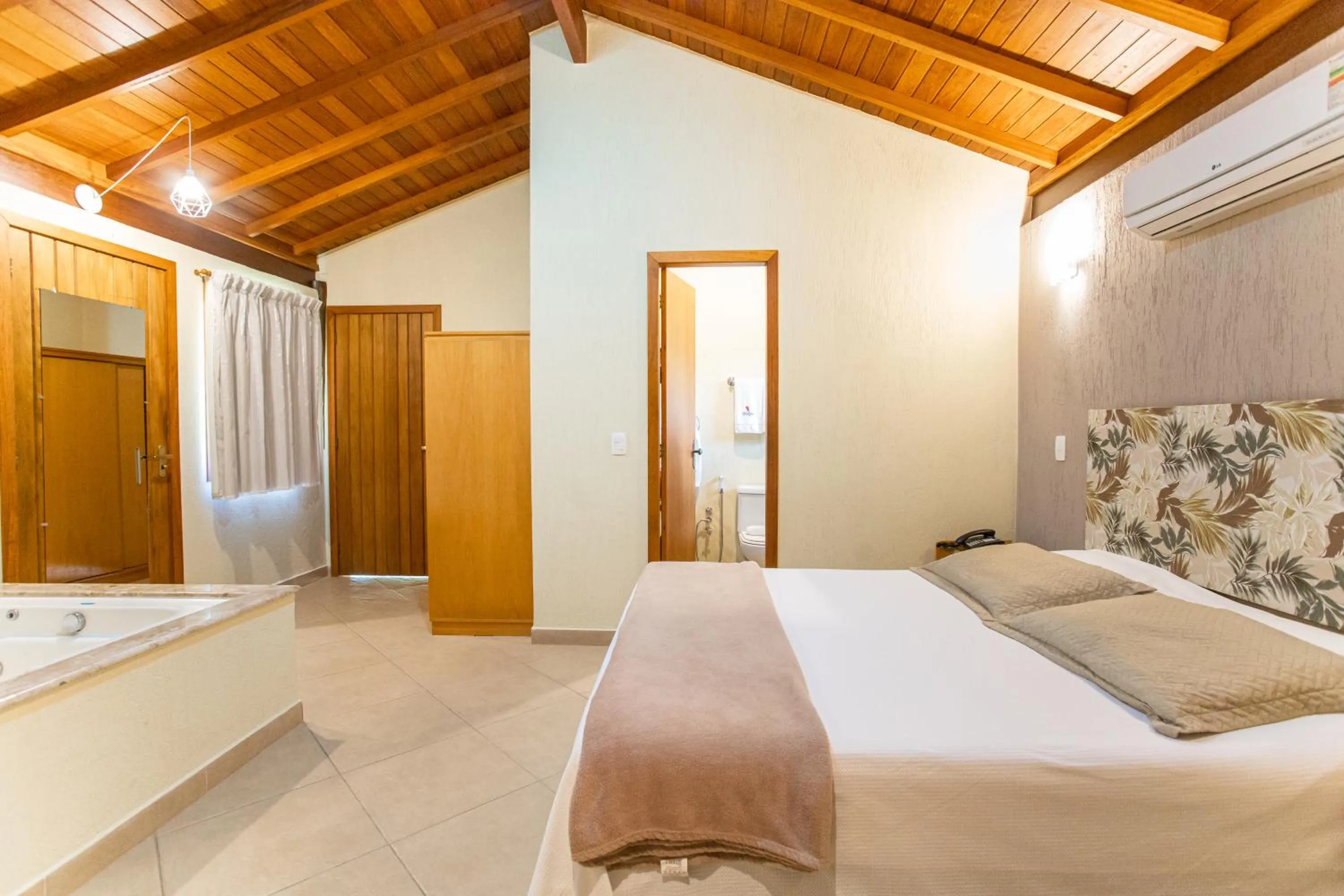 Photo of the whole room, Bed in Pousada Cantagalo