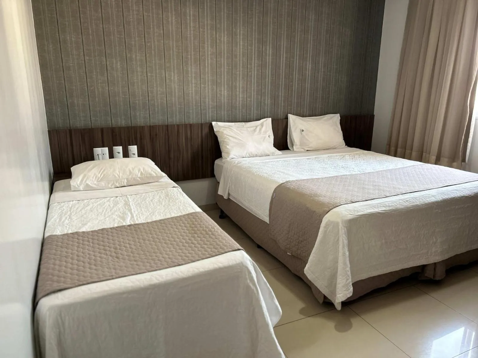 Bed in Premier Pallace Hotel