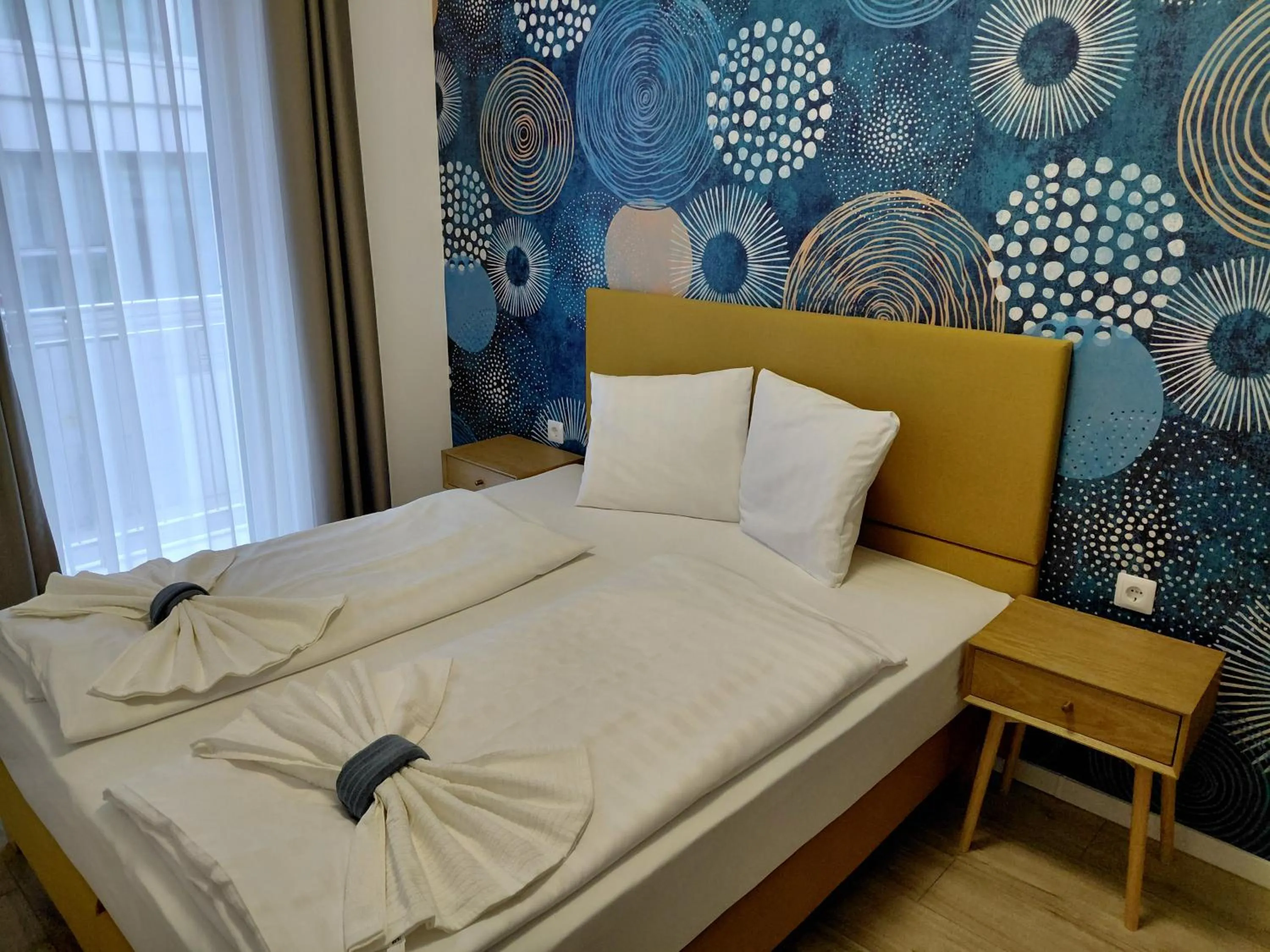 Bed in Nova City Apartments