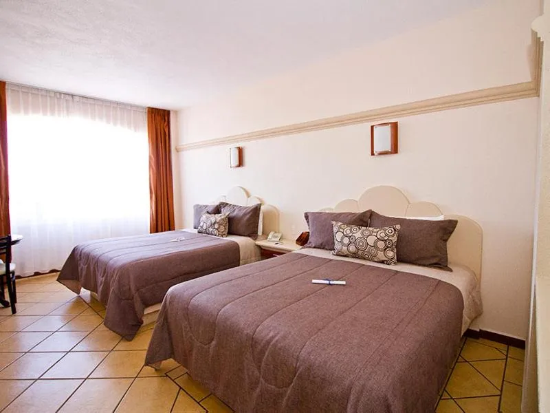 Photo of the whole room in Hotel 9 Manantiales