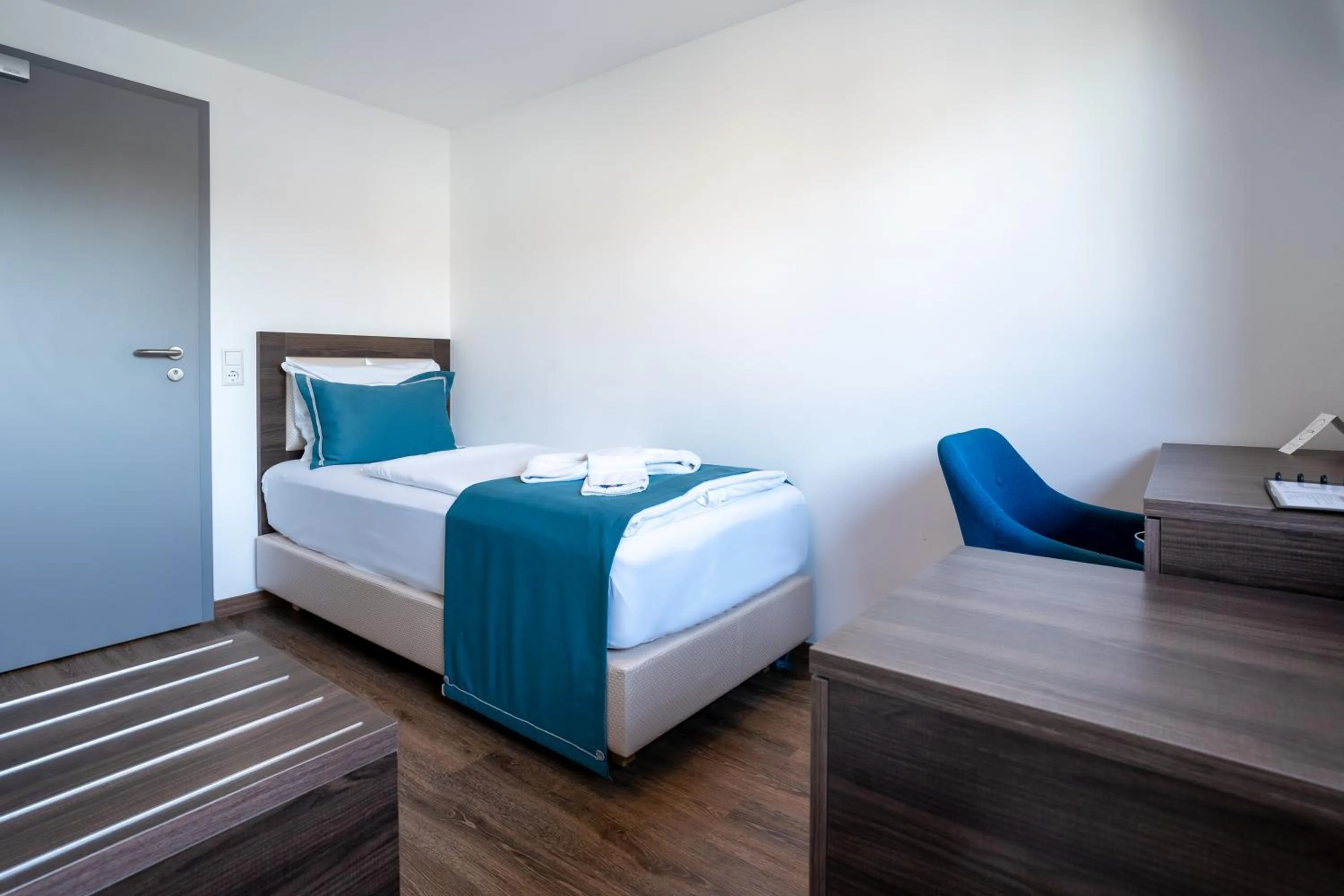 Bed in Hotel Myrsini