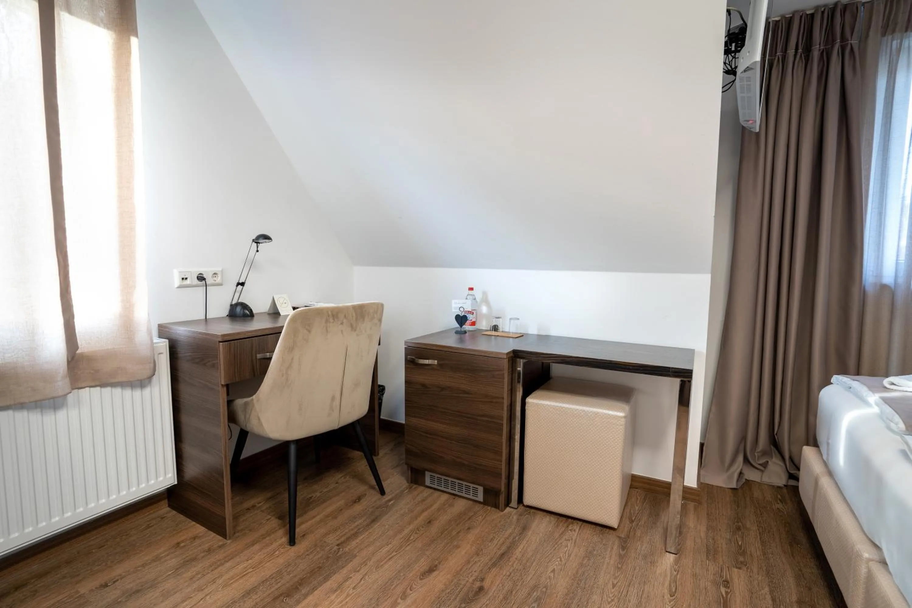 Seating area, Bed in Hotel Myrsini