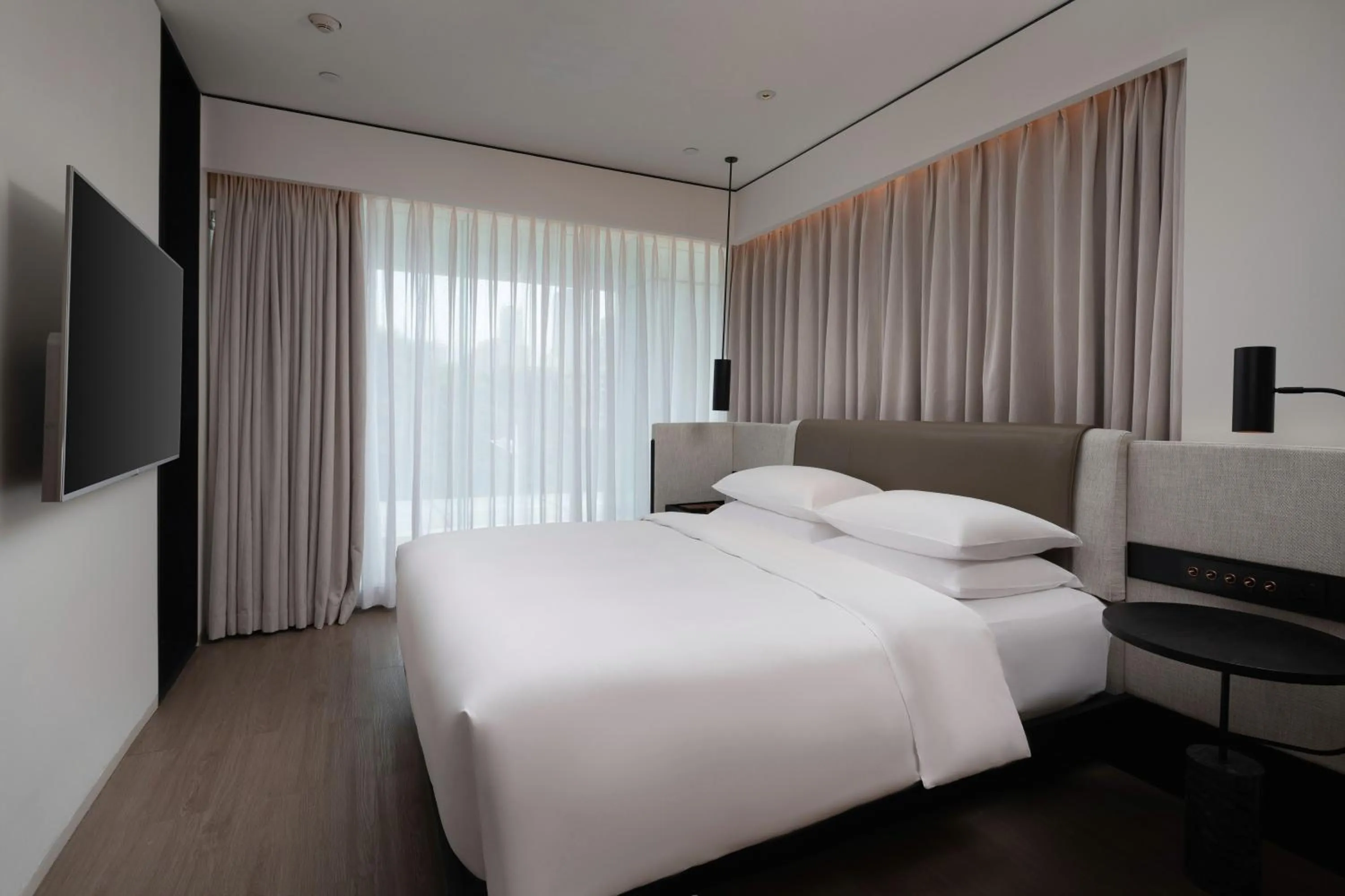 Bed in THE MUMIAN HOTEL Shenzhen luohu