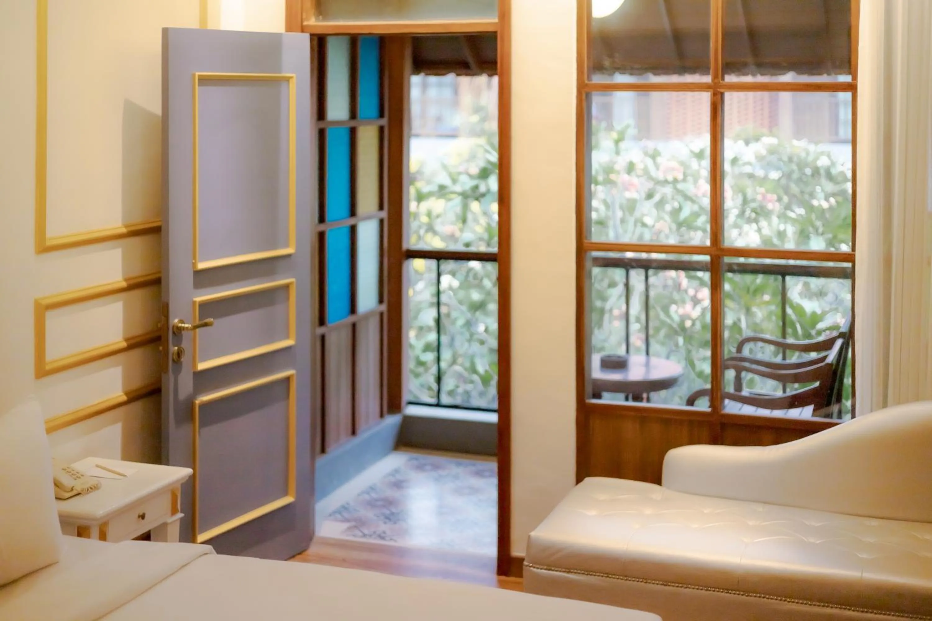 Bed in Fourteen Roses Boutique Hotel, Kuta