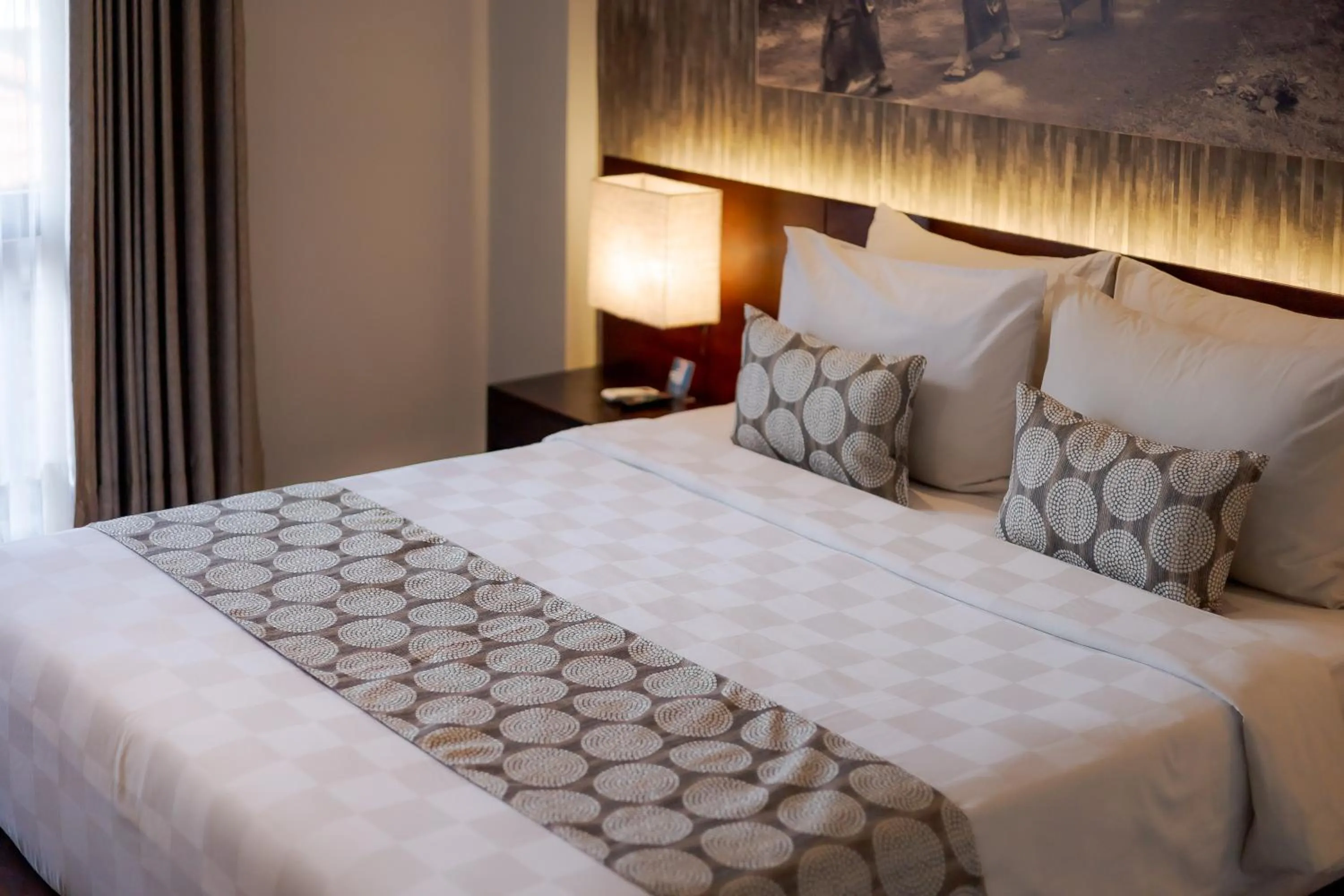 Bed in Fourteen Roses Boutique Hotel, Kuta