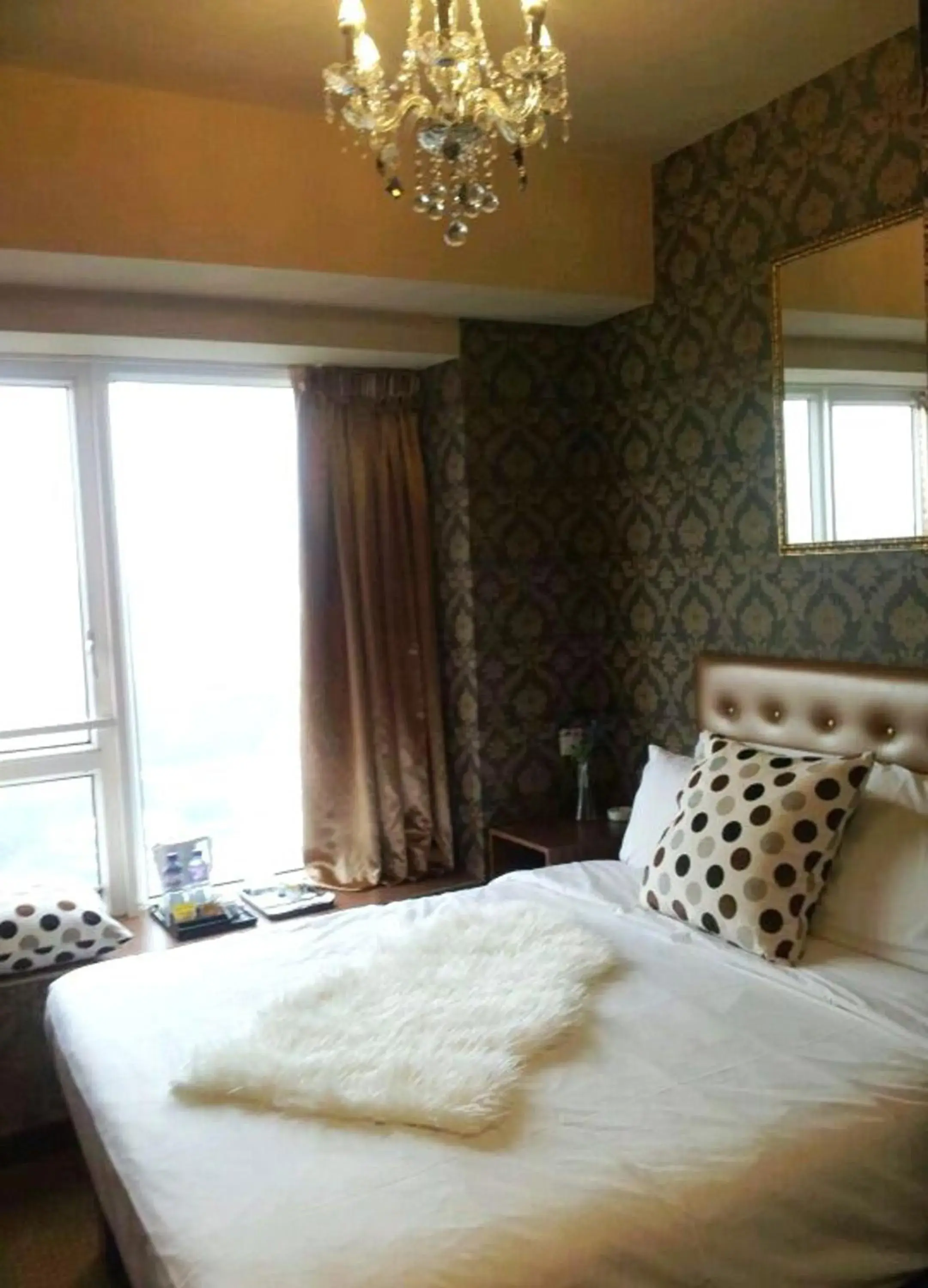 Bed in Ramada Grand Tsim Sha Tsui Bed in Ramada Grand Tsim Sha Tsui